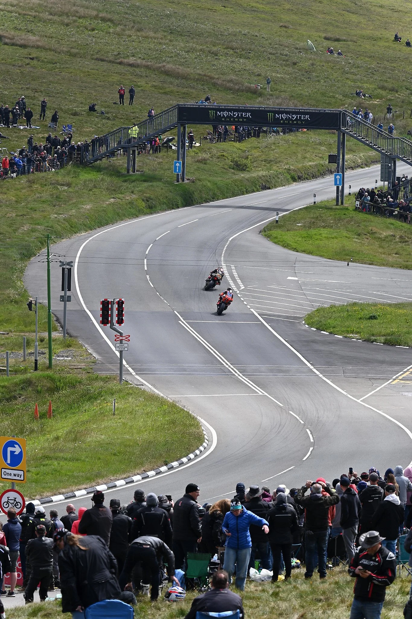 The riders begin to enter the last turn before the long straightaway on the mountain course. Photo taken at Bungalow.