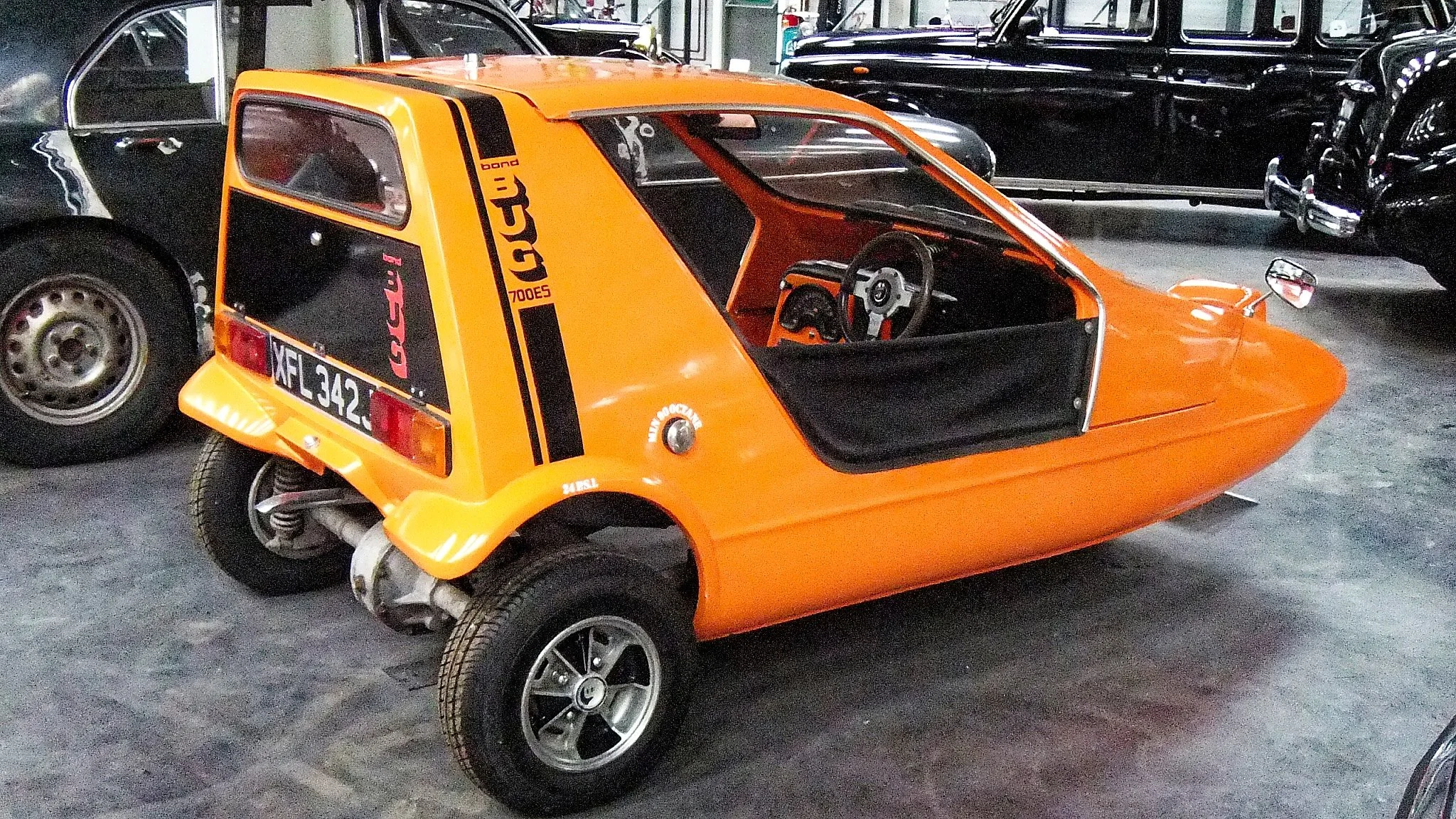 The Bond Bug. 1970 - 1974, approx 2270 made. They were eventually produced by Reliant Motors and shared some of the same parts as the Reliant Robin. Interesting note - the man who designed the Bond Bug also designed the land speeder in Star Wars. 