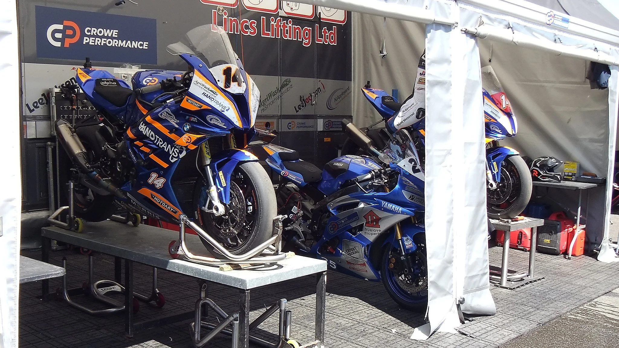 Before the races, you can wander through the paddock and see the race teams close up. This is #14 James Hind and #25 Philip Crowe. 