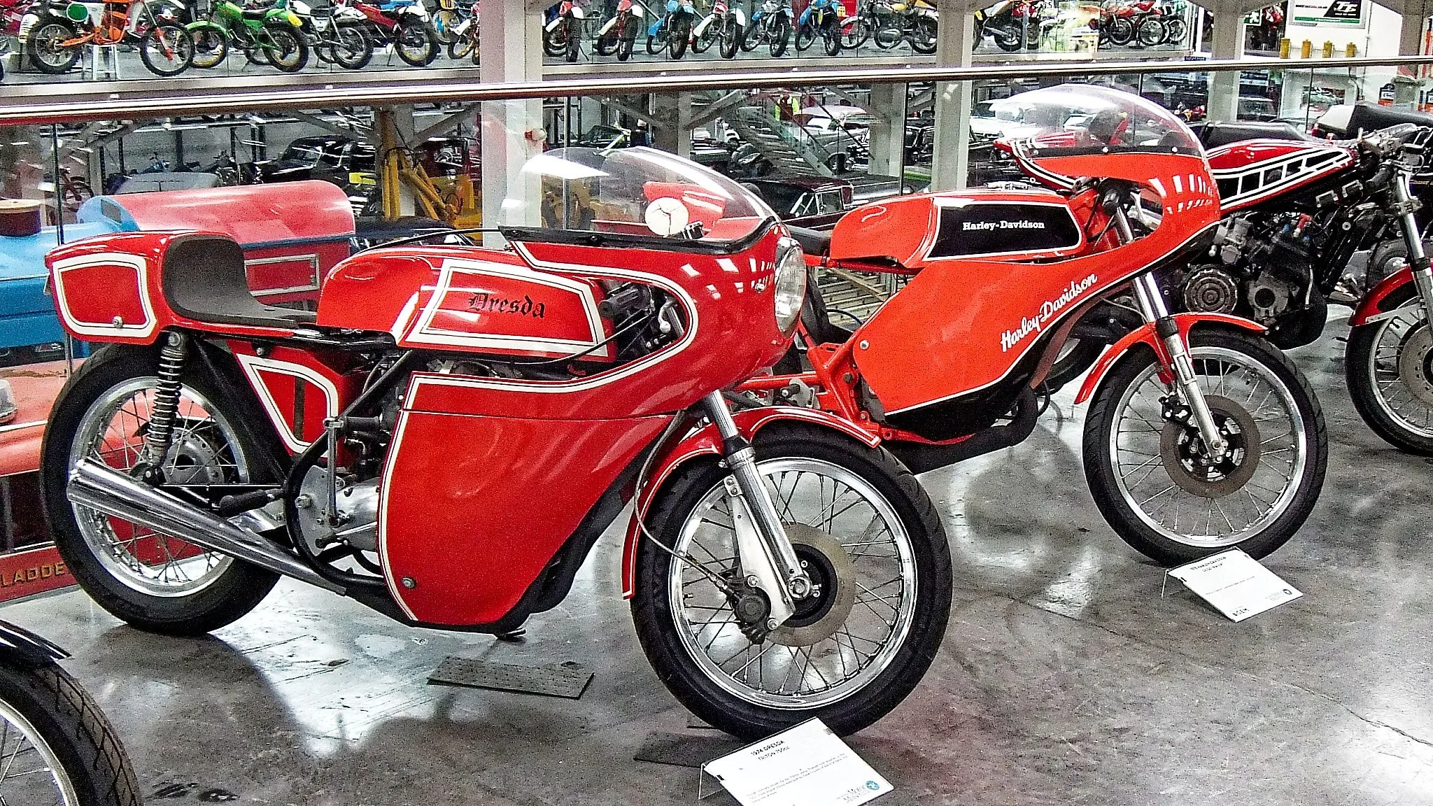 A Dresda next to a Harley Davidson. In 1978, Alan Cathcart raced a Harley Davidson in the 1978 Formula Three TT Race, completing the course with a time of 1.43.04.2 and speed of 87.85 mph.  A total of 11 H-D's competed in the TT, with 5 finishing the