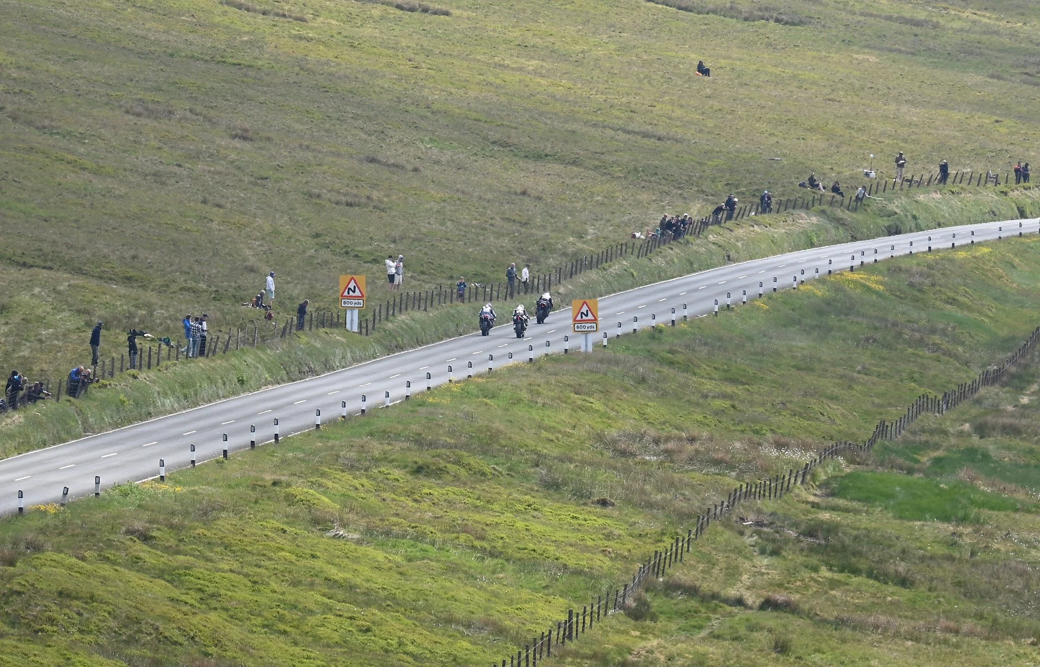A trio of riders make their climb over the mountain. Even at this distance, you can still hear the the engines.  Photo taken at Bungalow. 