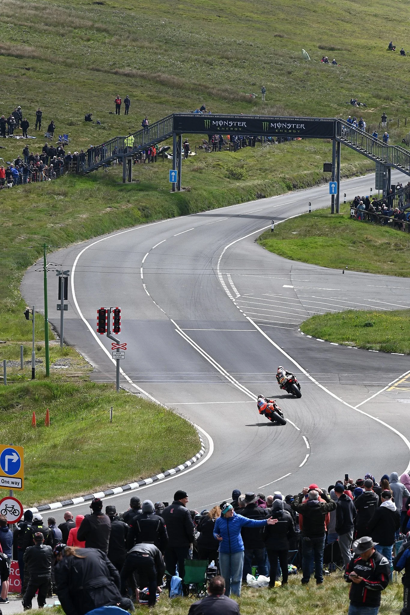 A pair of riders navigate the curves at Bungalow before heading over the mountain before descending into the final section of the course. Photo taken at Bungalow. 