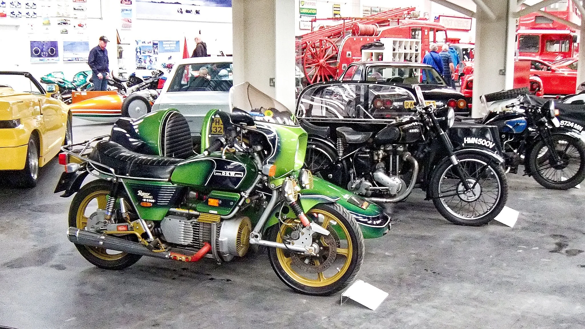 Suzuki wasn't the only motorcycle company to put a Wankel rotary engine in a bike.  The Germans did it first - The Hercules W-2000 (DKW) The sidecar and lime green paint wasn't stock.