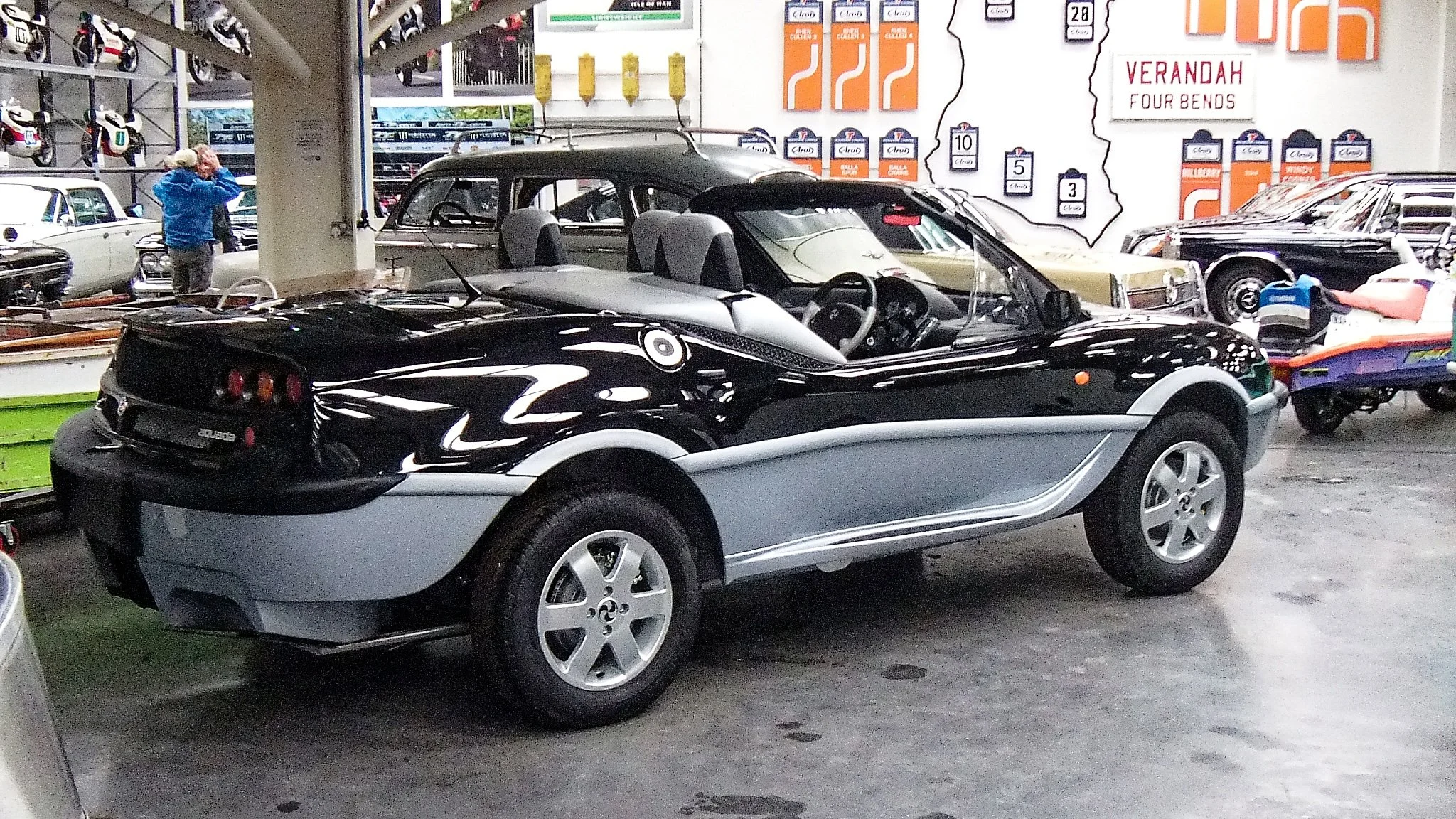 Developed in New Zealand, the Gibbs Aquada (2003-2004), was a fully amphibious car that could reach speeds of 99 mph on land an 27 kts on the water. In 2004, Sir Richard Branson set the record of crossing the English Channel in one of these - 1hr, 40