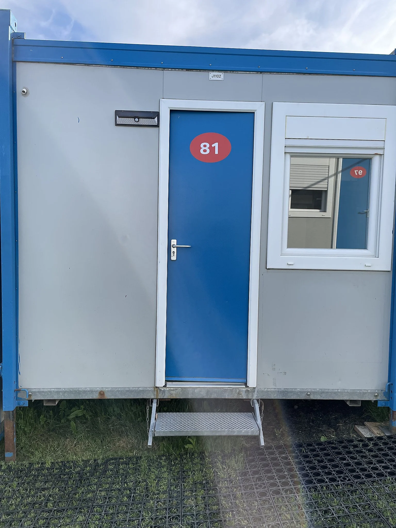 I call it "my shipping container house", but it's actually a purpose-built self contained module with two beds and a bathroom.  