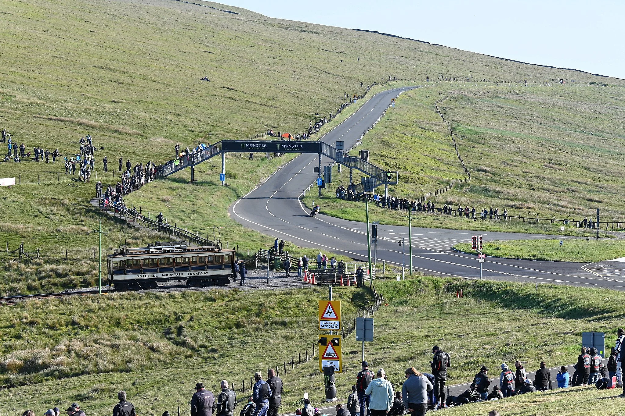 The Snaefell Mountain Tramway continues to run during the race, allowing spectators to come and go. Photo taken at Bungalow. 