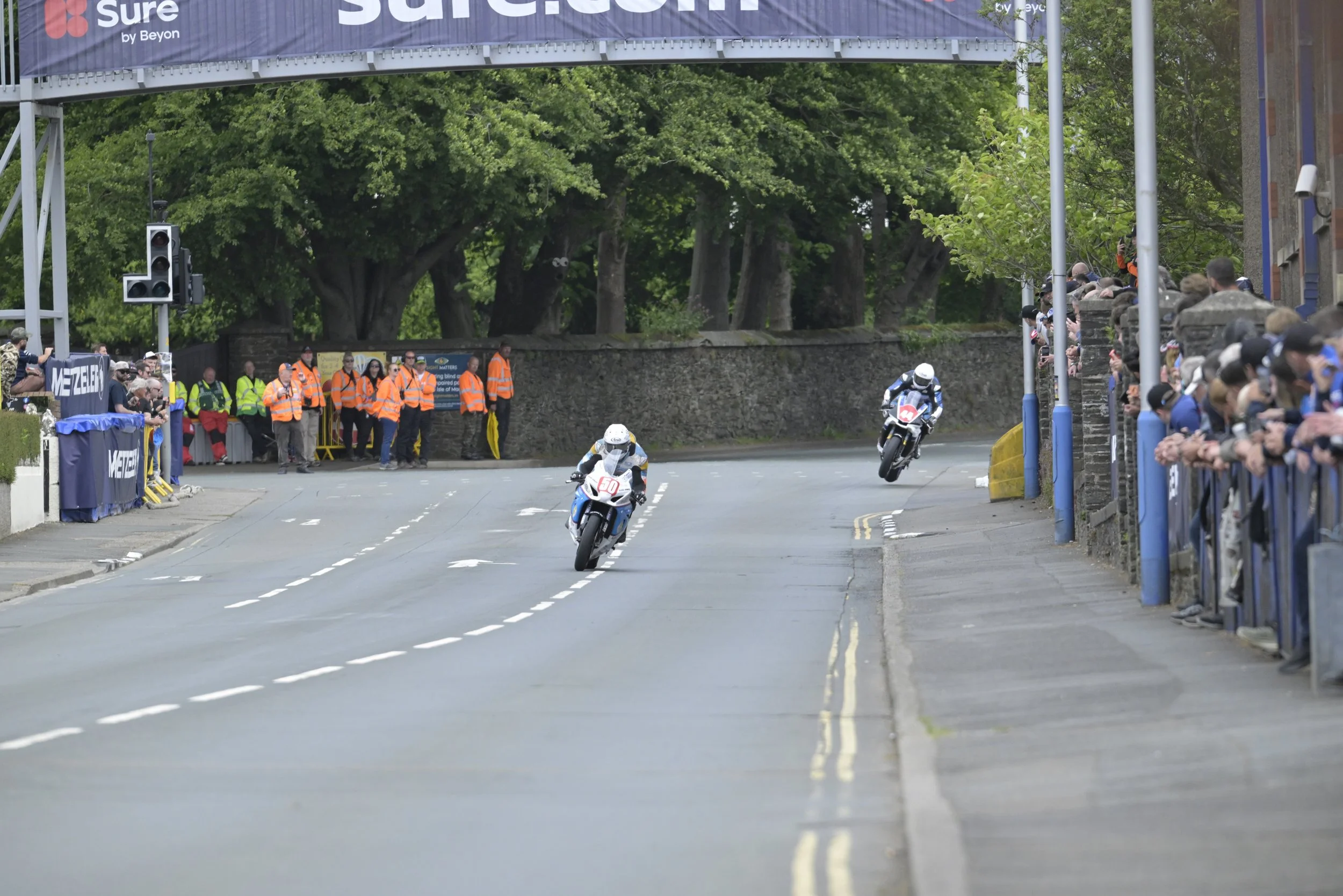 RST Superbike TT. #50 Ryan Whitehall - Suzuki R1000 - WR Racing/Reel Networks (in front), #44 Tom Robinson - Yamaha YZF-R1 - Pete Stacey Racing (in back). Note - #44 has both wheels off the ground. Photo taken at Bray Hill.