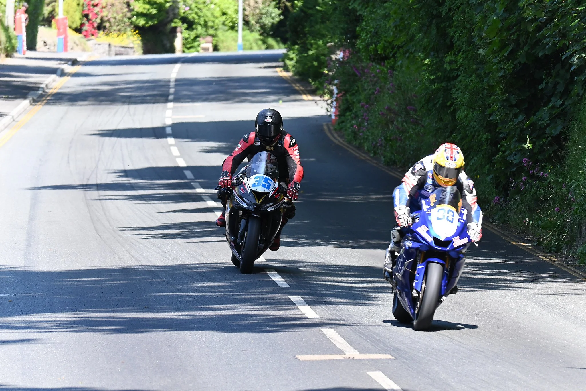 #35 Amalric Blanc - 636 Kawasaki - Team B&M/Team Gazzz 58 racing (l) and #38 Mark Goodings - 600 Yamaha - IPG Power Generation racing (r) both downshift and enter the bottom of Quarterbridge Road. Photo take at Quarterbridge Road. 
