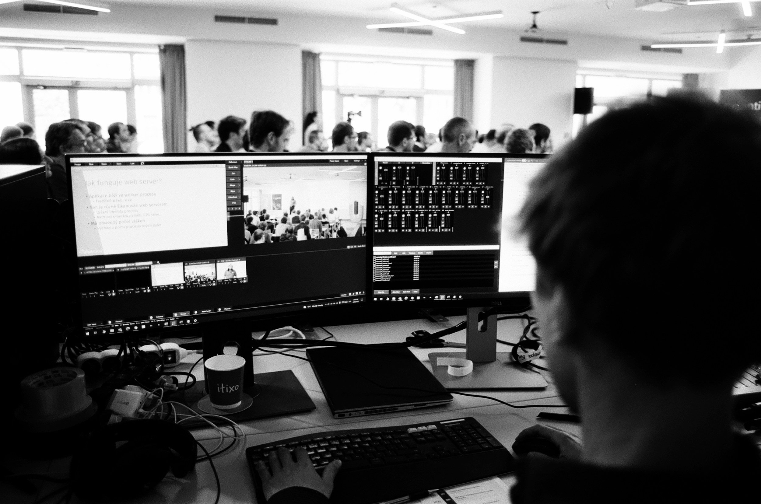 Employee working with digital systems in a technology-enabled workplace.