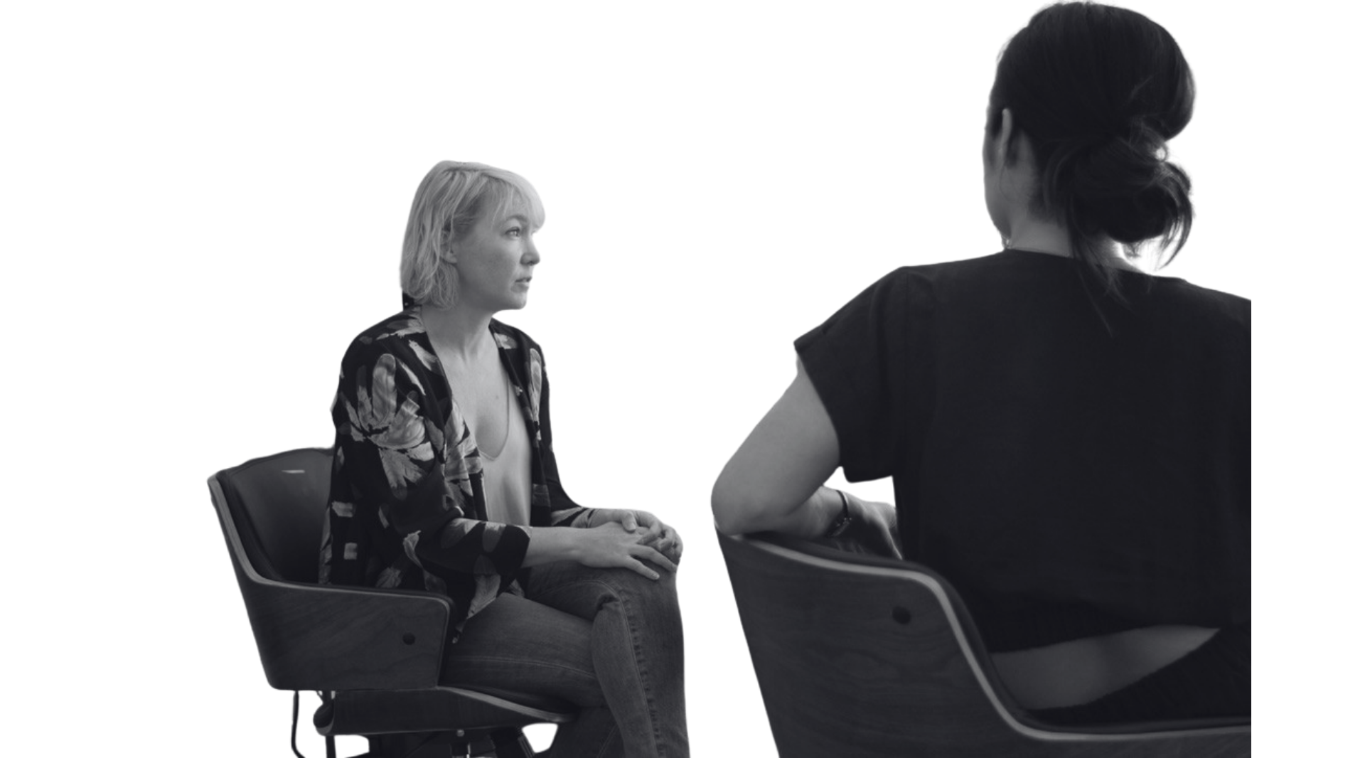 Two people participating in an interview during an organizational assessment.