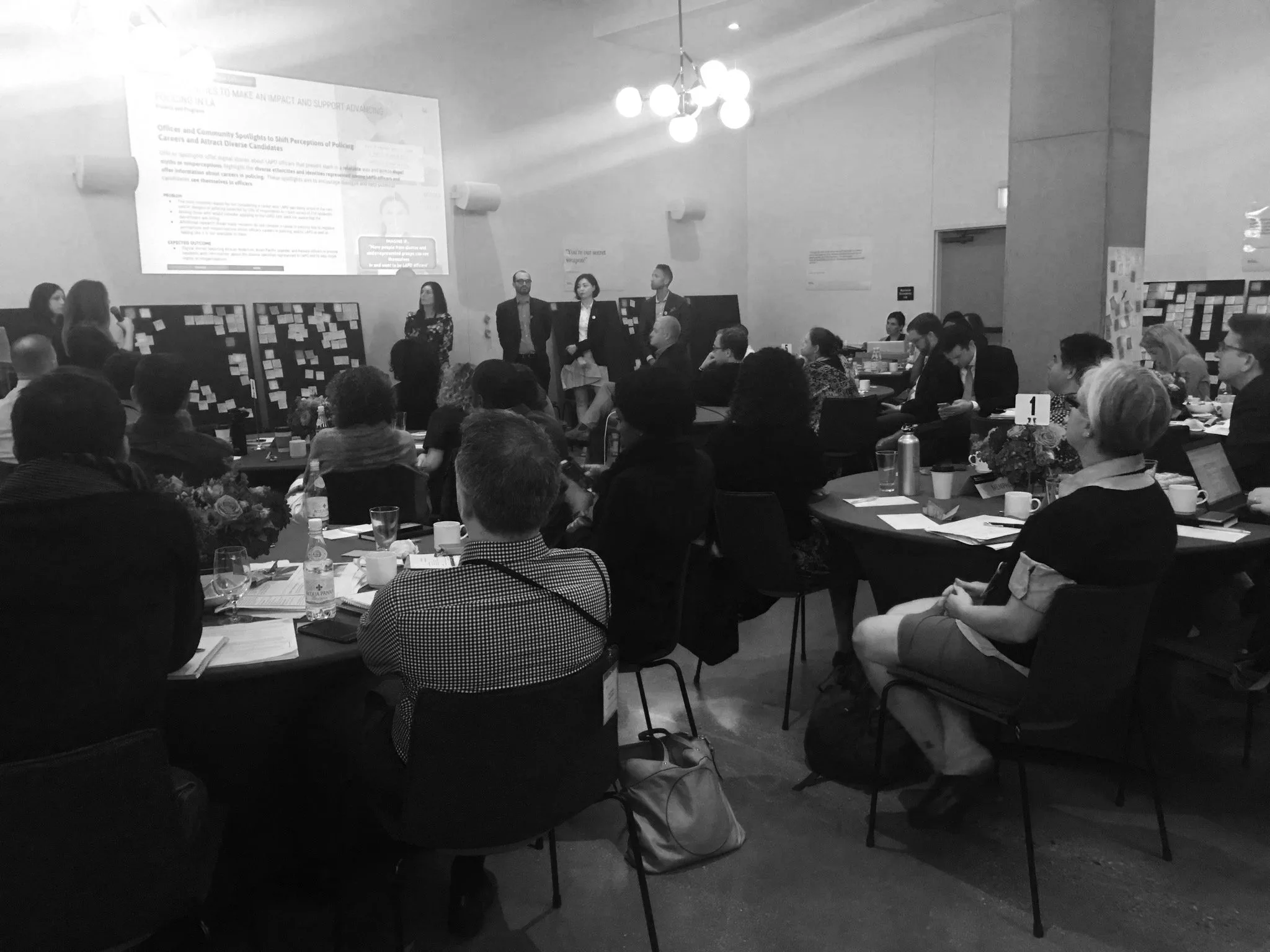 Participants working together during a facilitated participatory design workshop.