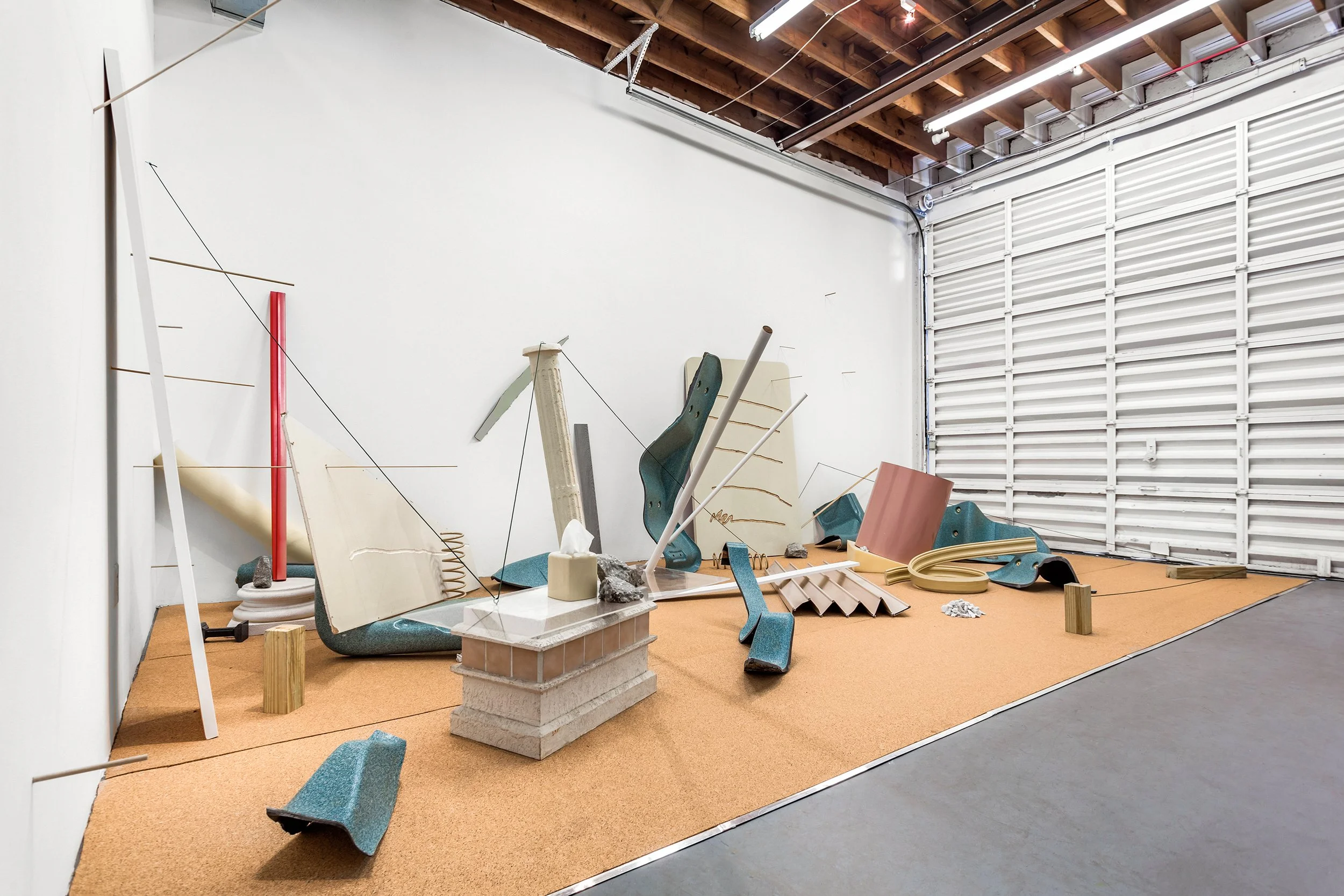 'Backsplash', 144 x 276 x 108in Cork, foam, drywall, laminate, wood, plexiglass, rocks, plastic, Kleenex box, rubber, springs, steel, and hot tub fragments (Locust Projects, Miami). 2016.