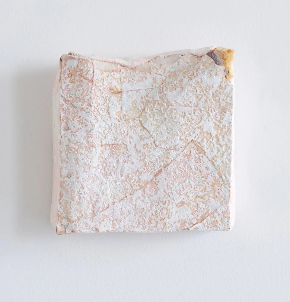 'Beside Me'
8 x 8 x 2in Plaster, paper, foam, laminate, acrylic, and nails. 2013