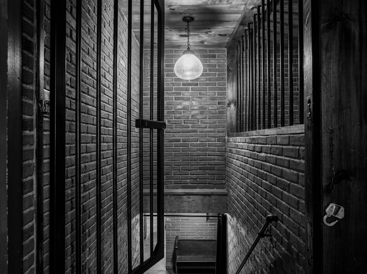 The speakeasy stairs downstairs at 23 East Market Street