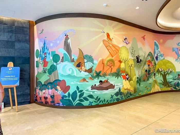 2023-ae-dlr-the-villas-at-disneyland-hotel-grand-opening-lobby-mural-2-700x525.jpg