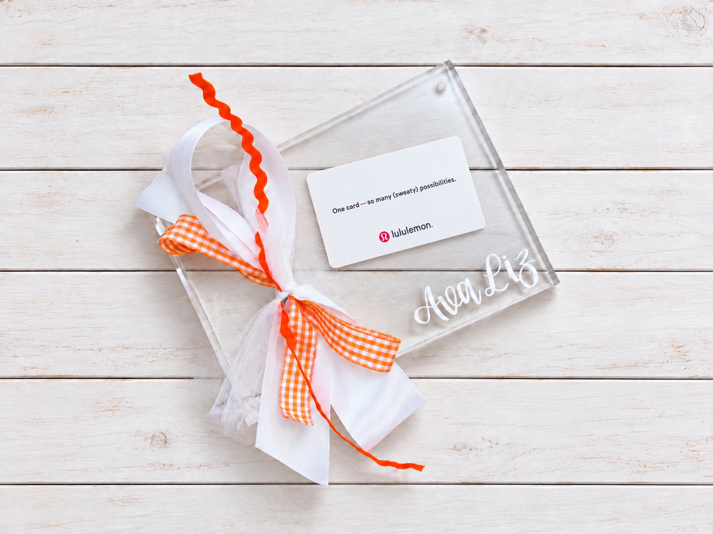 Lululemon gift card in acrylic frame.png