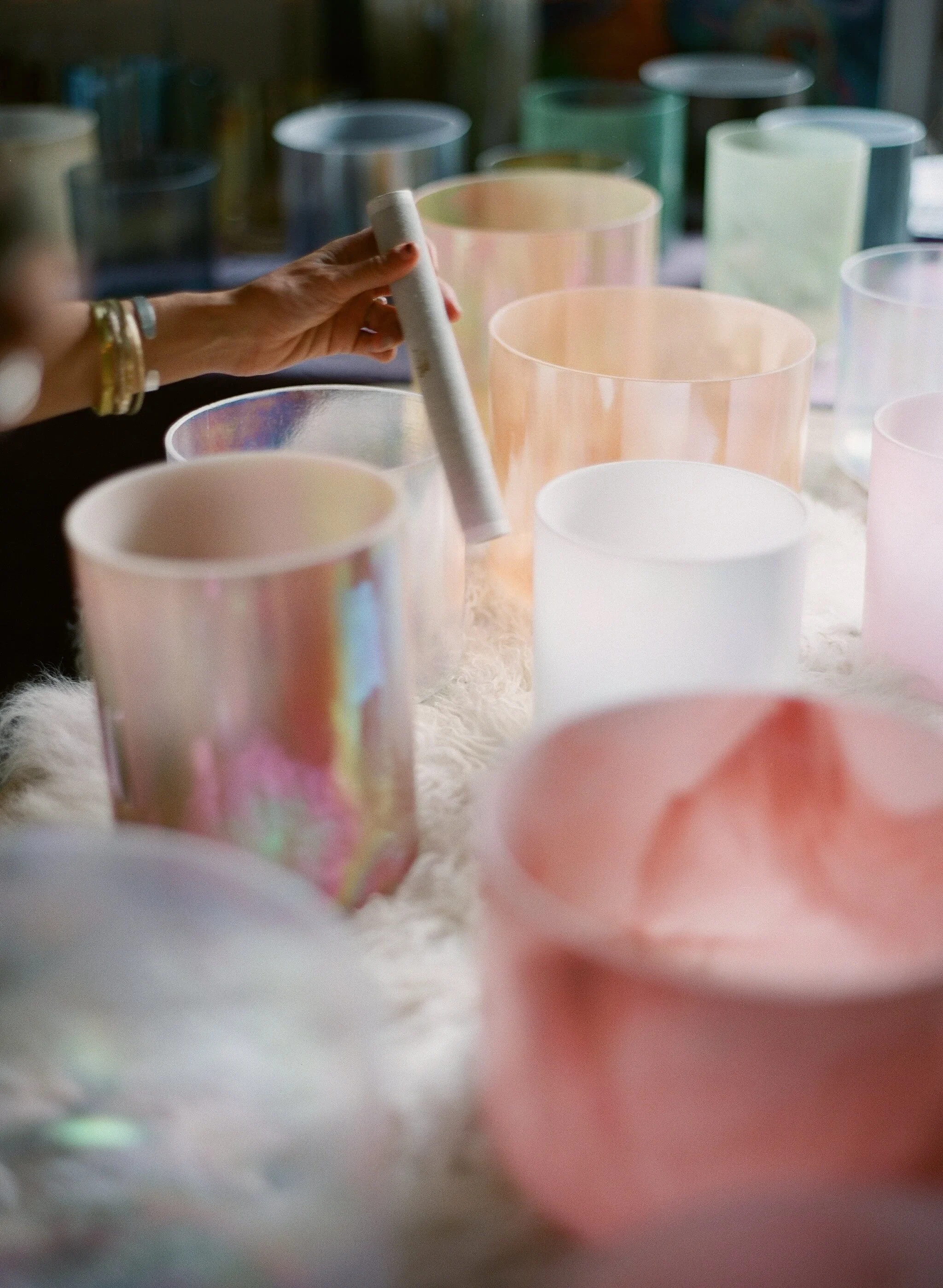 Crystal alchemy singing bowls used in private sound healing sessions in Austin, Texas by Jenn Mazuelos