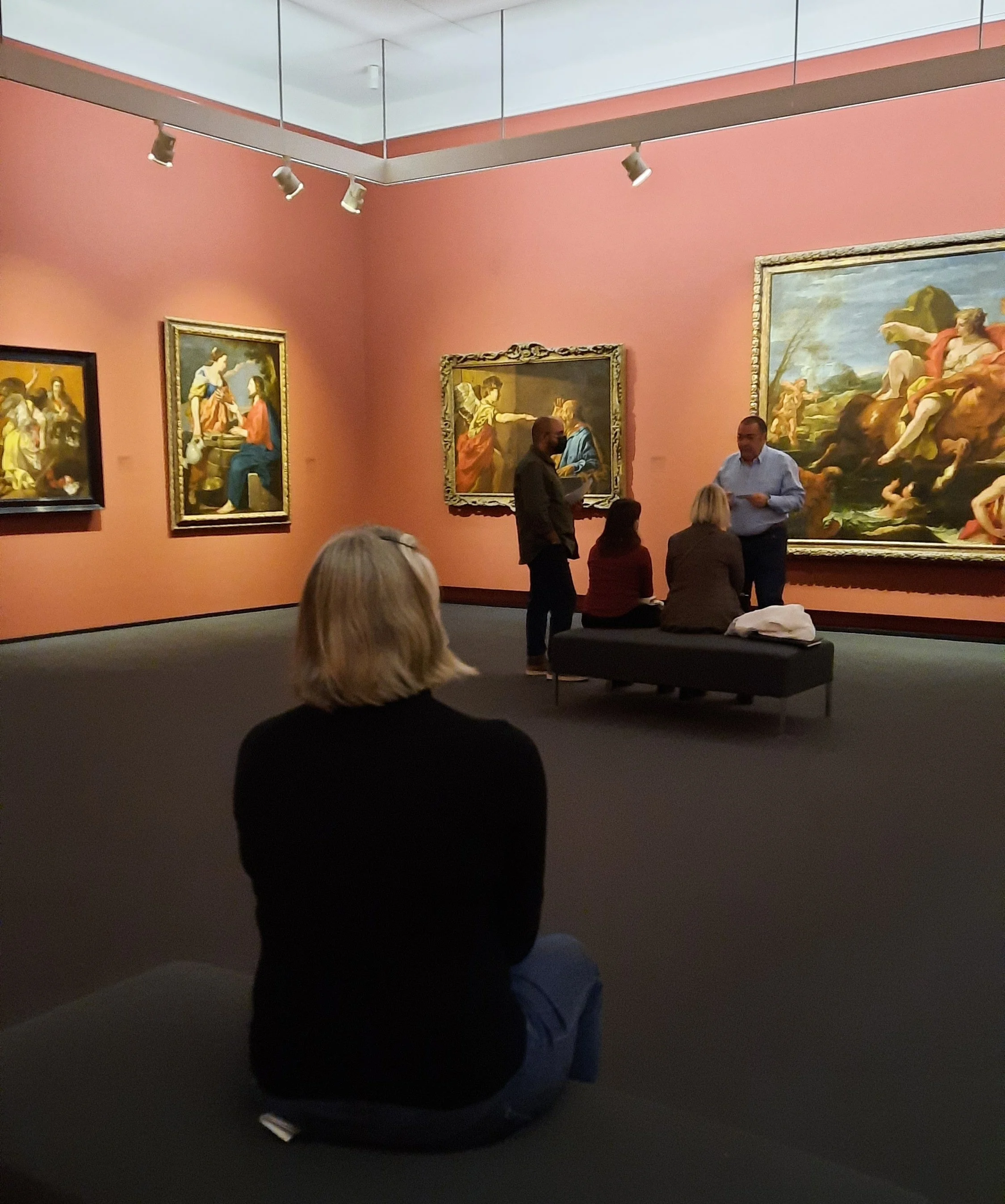 Veronika Kyrychenko observing contemporary artworks during a museum visit.