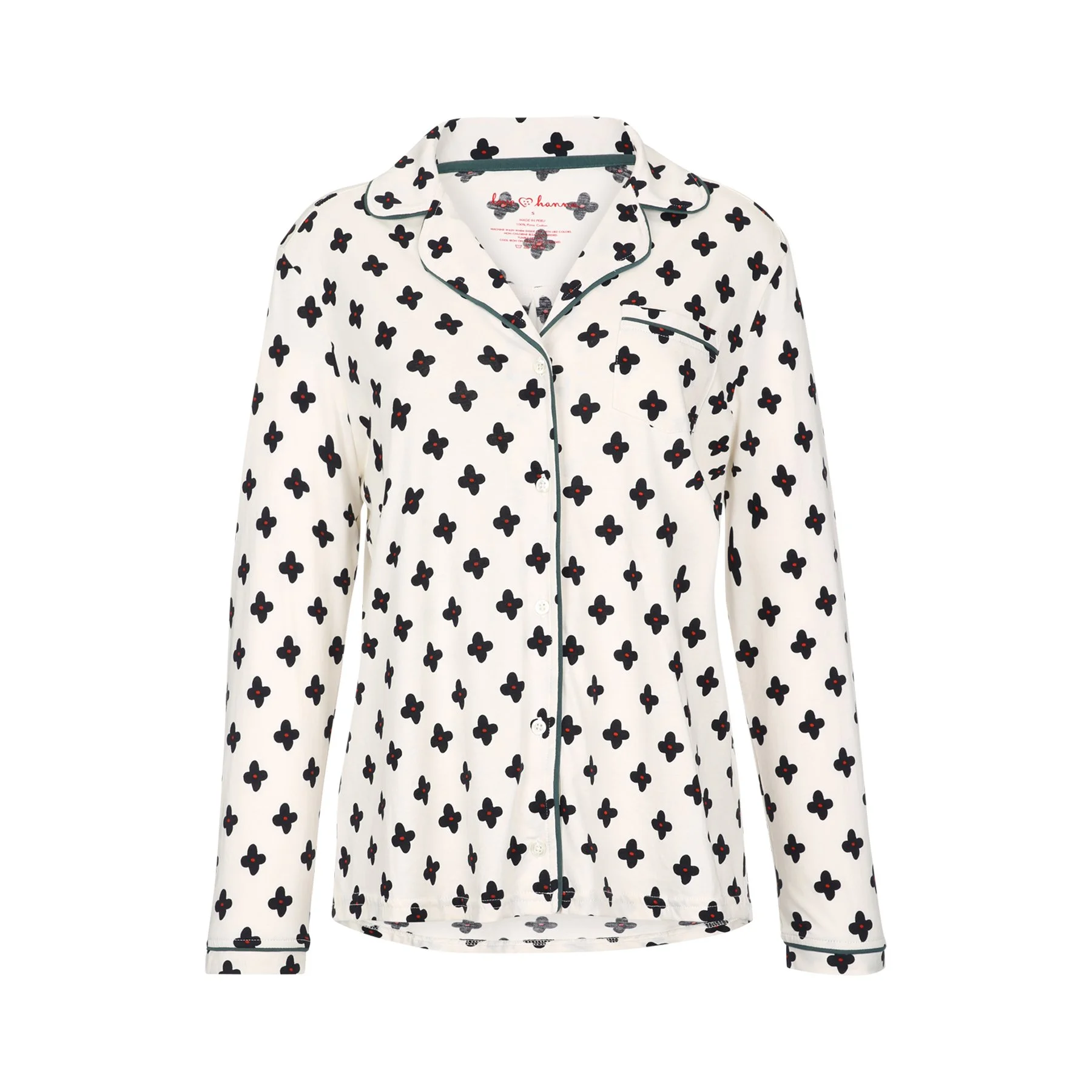 White long-sleeve pajama top with black and red flower pattern, green piping along the collar and button placket.