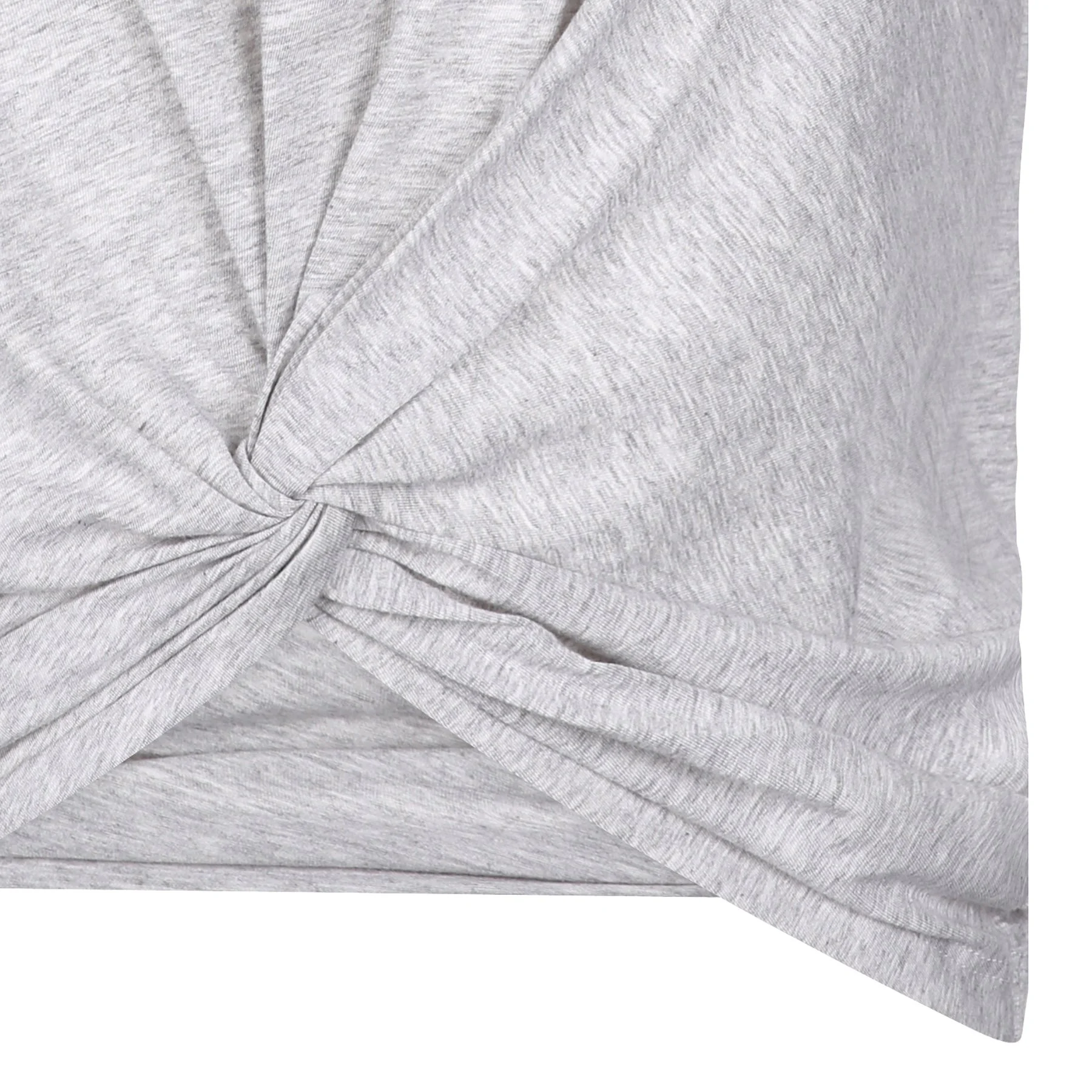 Close-up of a light gray fabric with a knot detail.