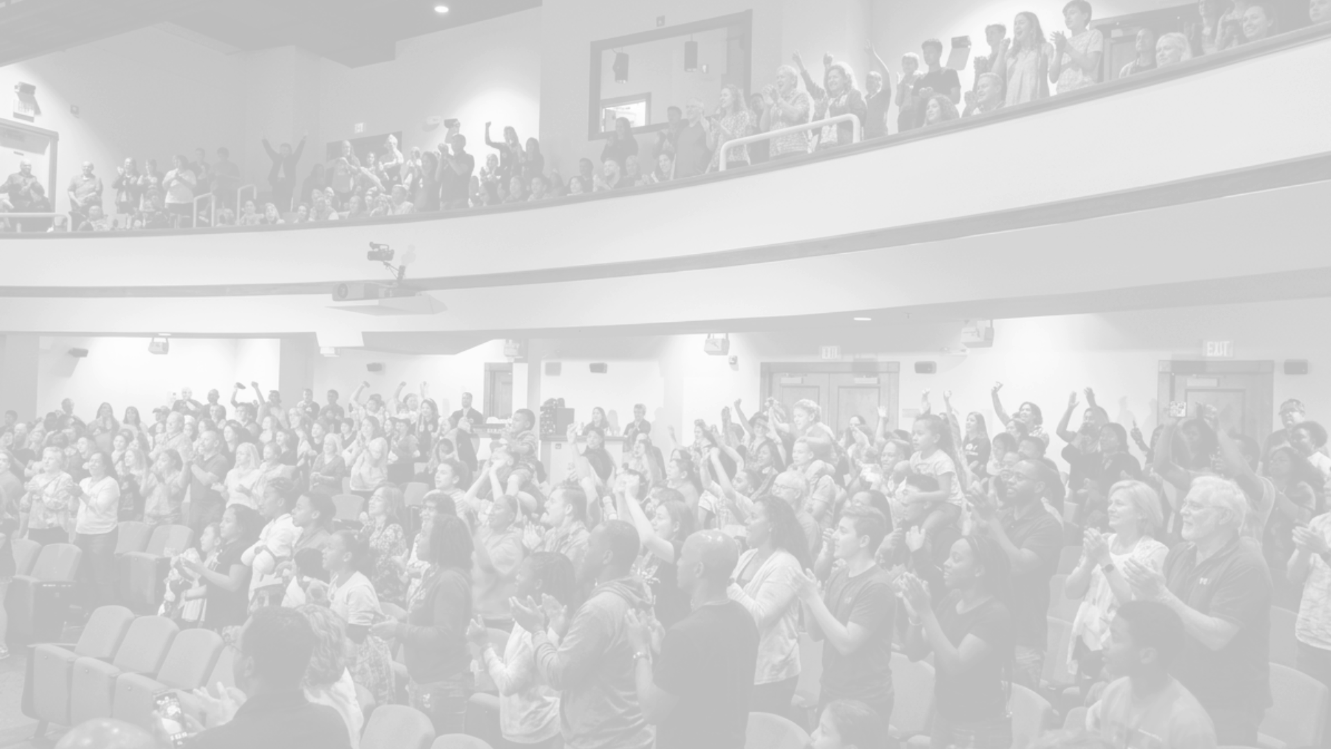 A crowd enjoying an event at the Dixie Carter Performing Arts Center auditorium.