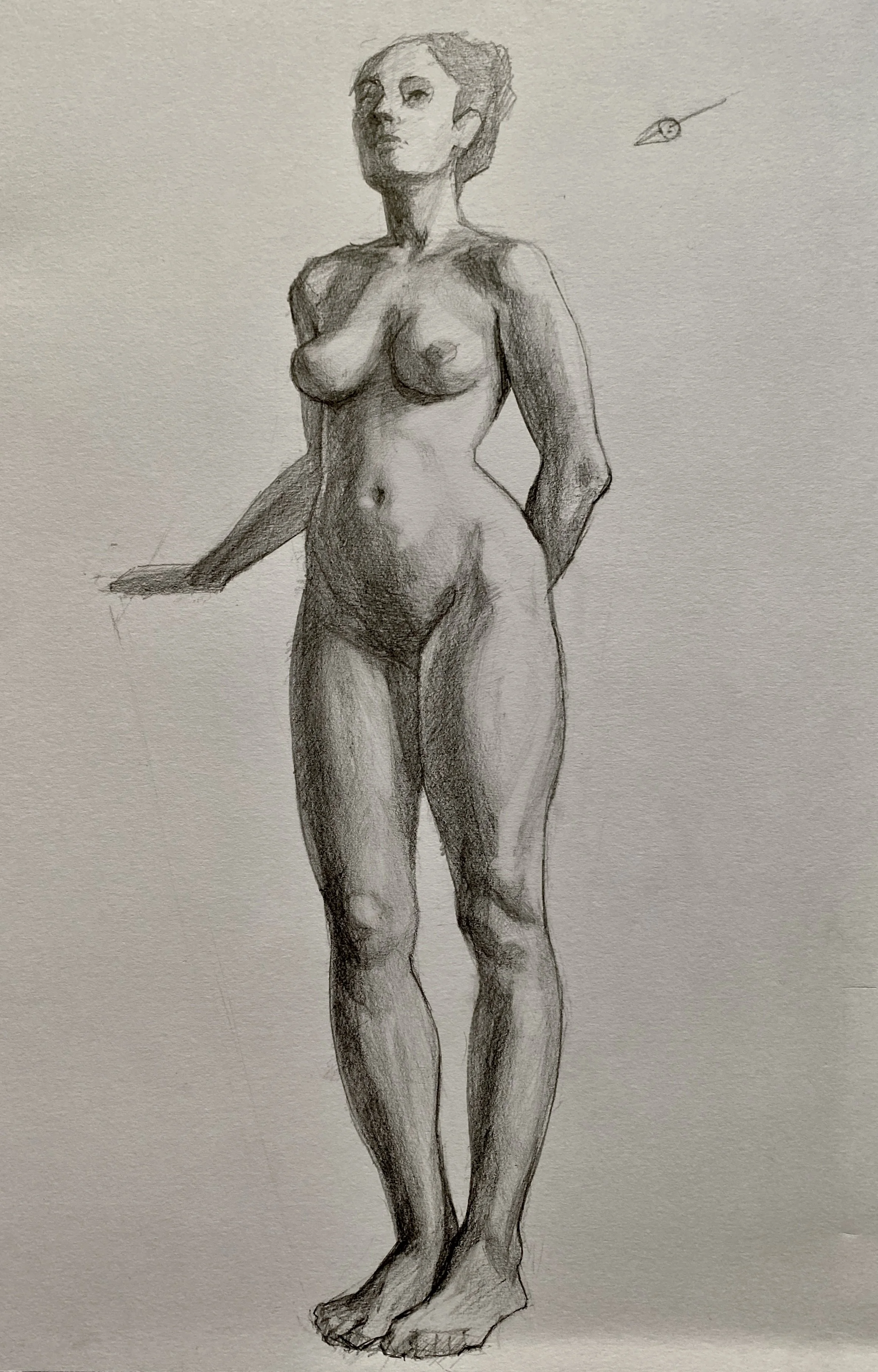 A detailed pencil sketch of a nude woman standing with her weight shifted to one leg, her arms behind her back, and her head turned slightly upward.