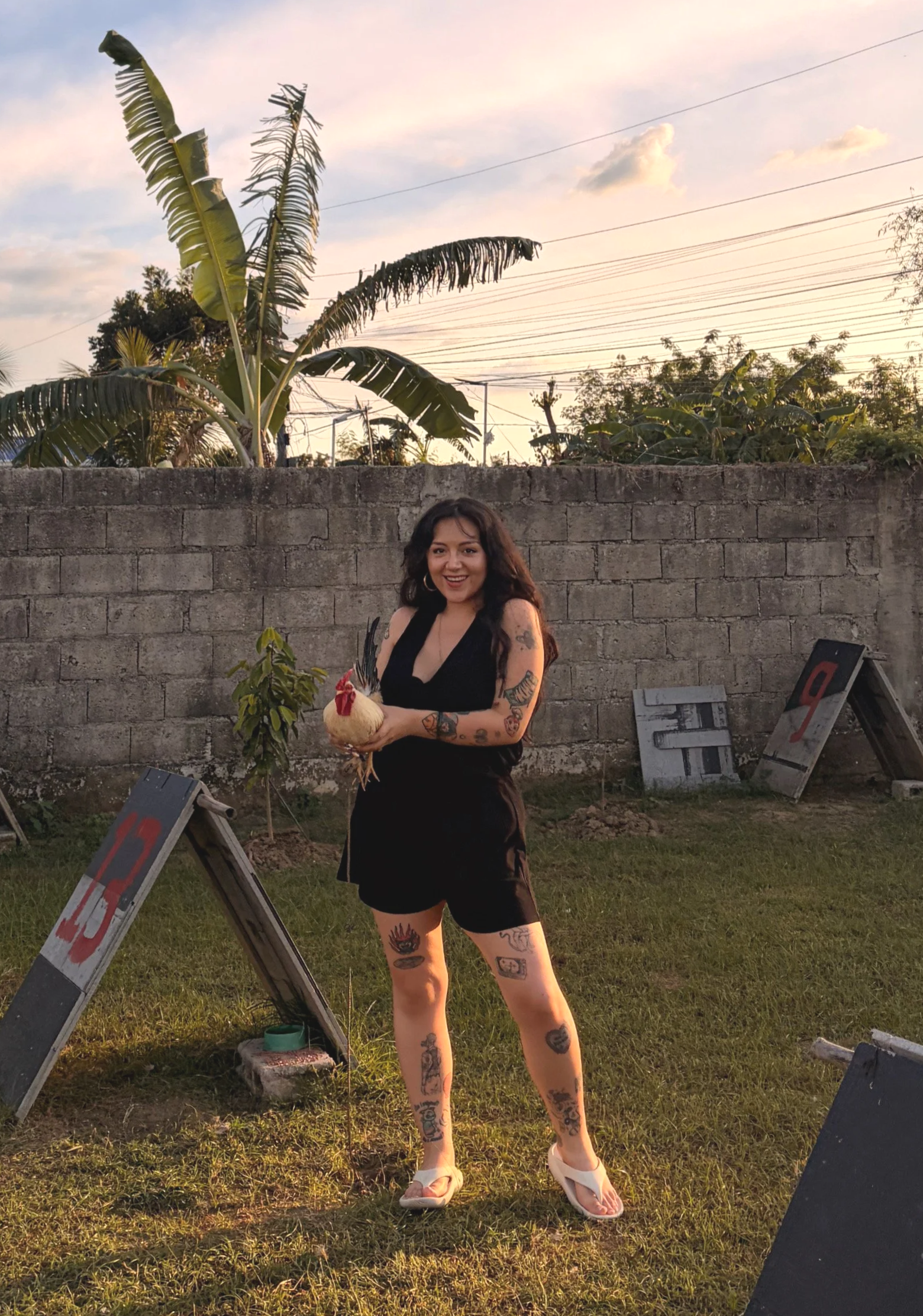 Picture of Luisa holding a chicken