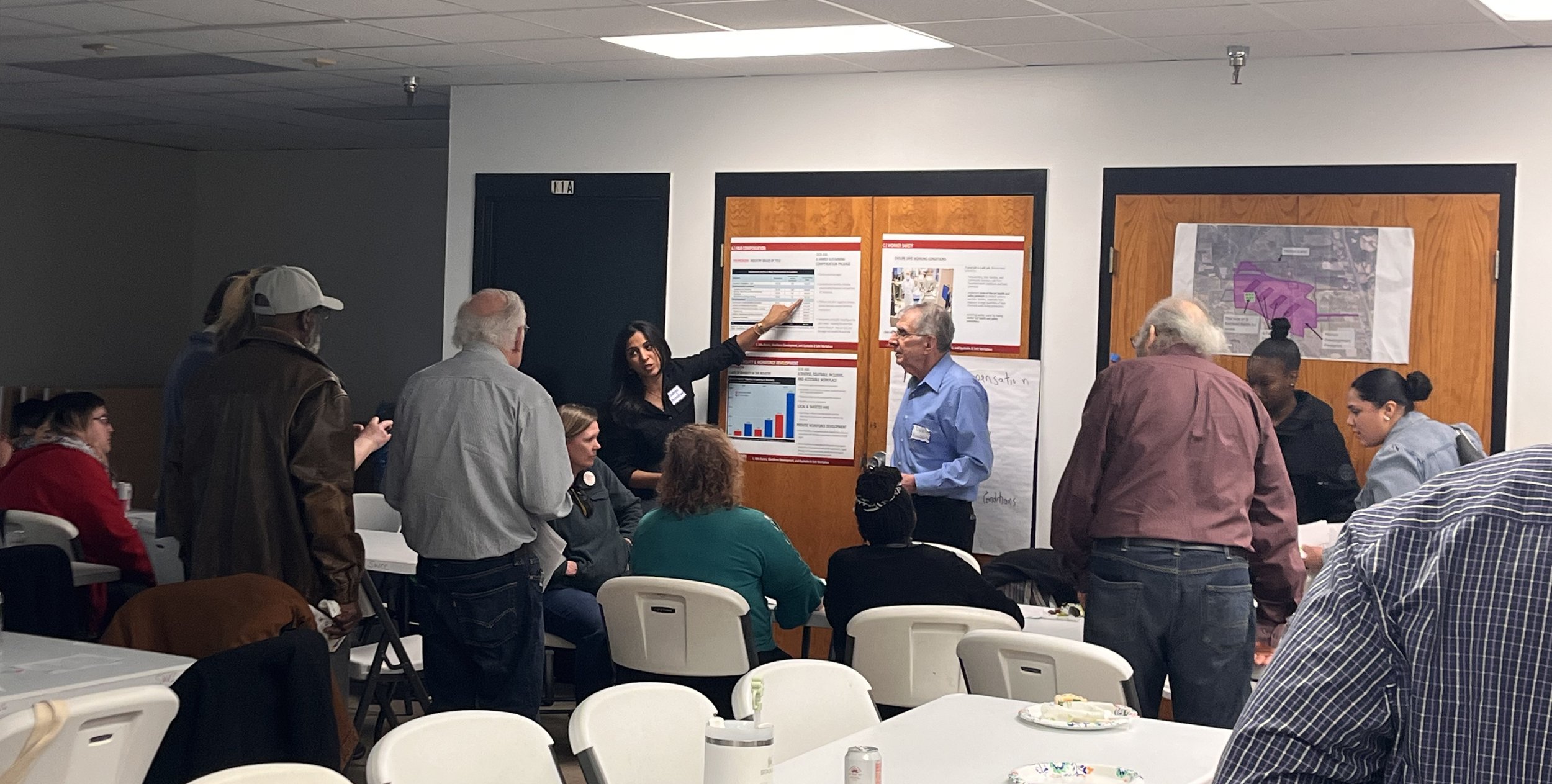 A group of neighbors discuss the Micron project in Clay