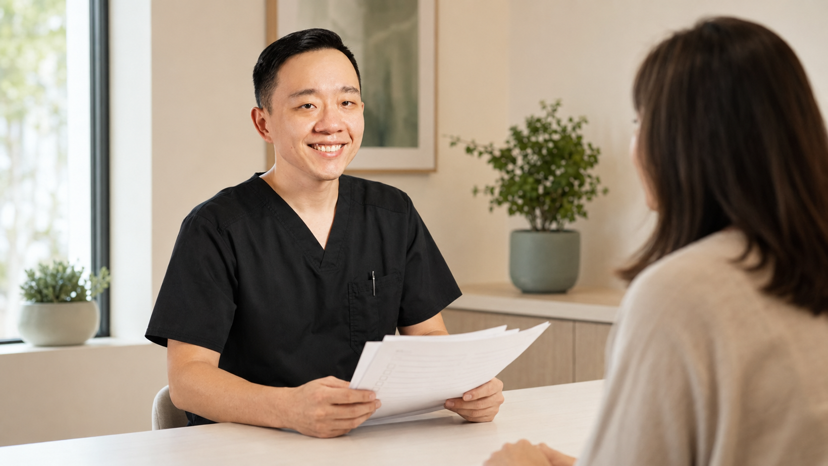 Arizona physician reviewing medical documentation with a patient