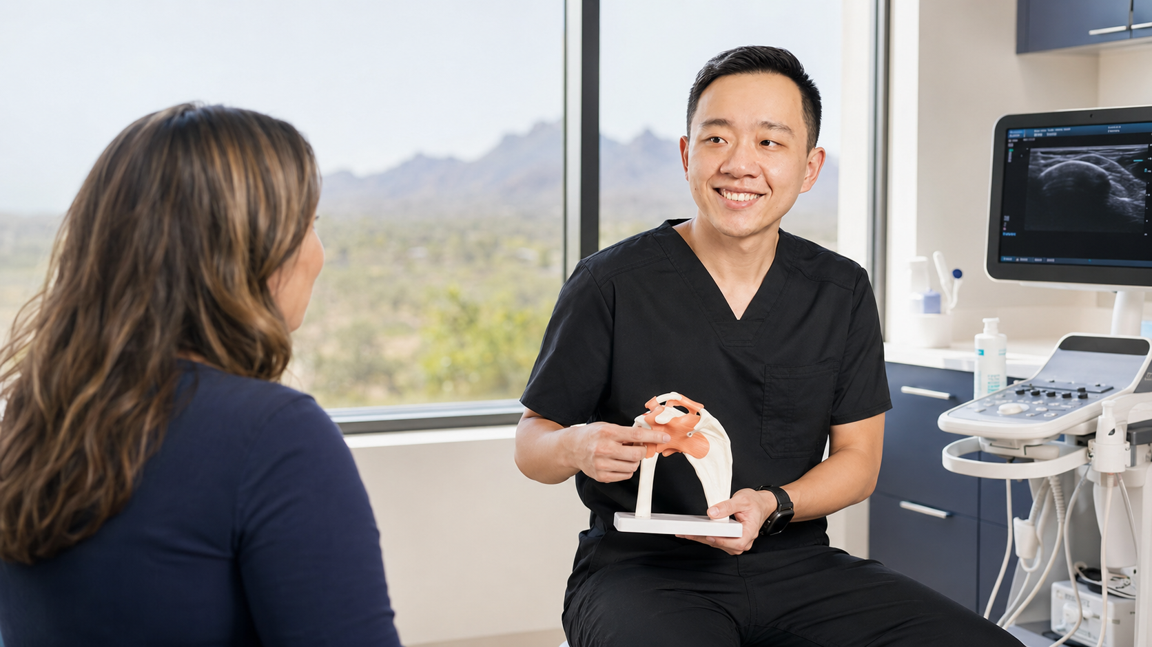 Physician discussing personalized integrative pain management options with a patient in Arizona