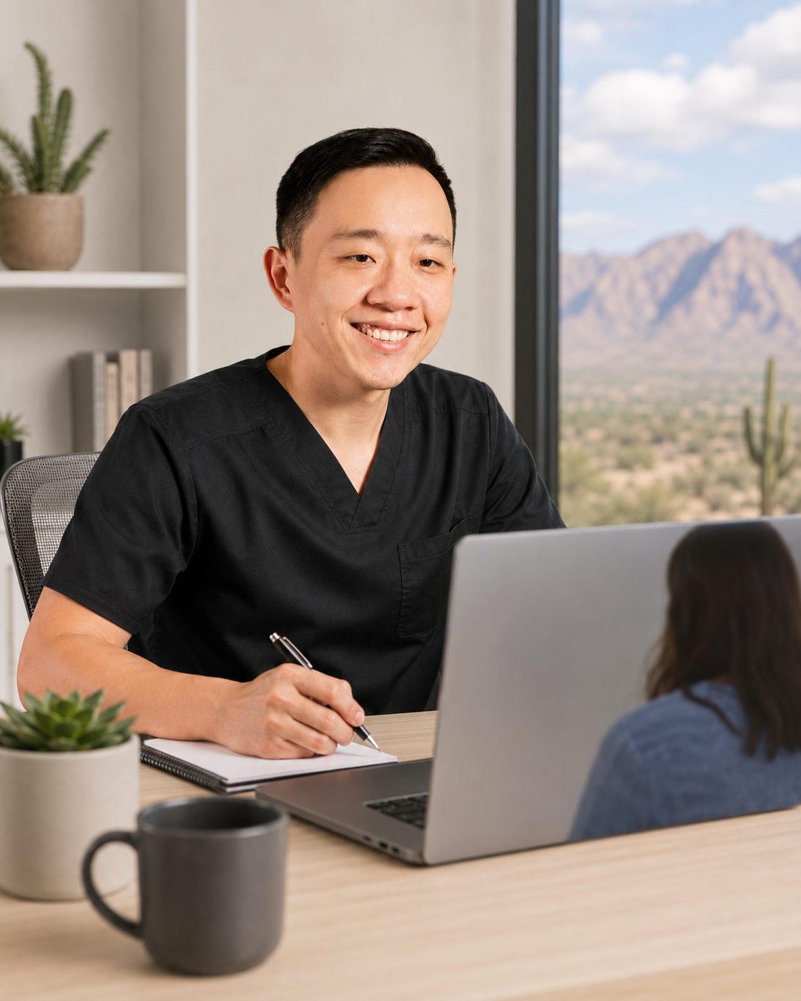 Dr. YiQiu Hu providing a telemedicine consultation for a patient in Sierra Vista Arizona