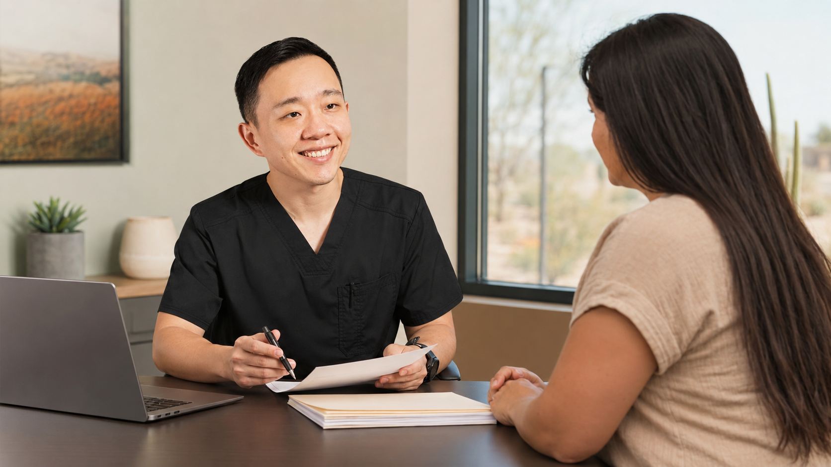 Dr. Hu reviewing a medical documentation request with an Arizona patient