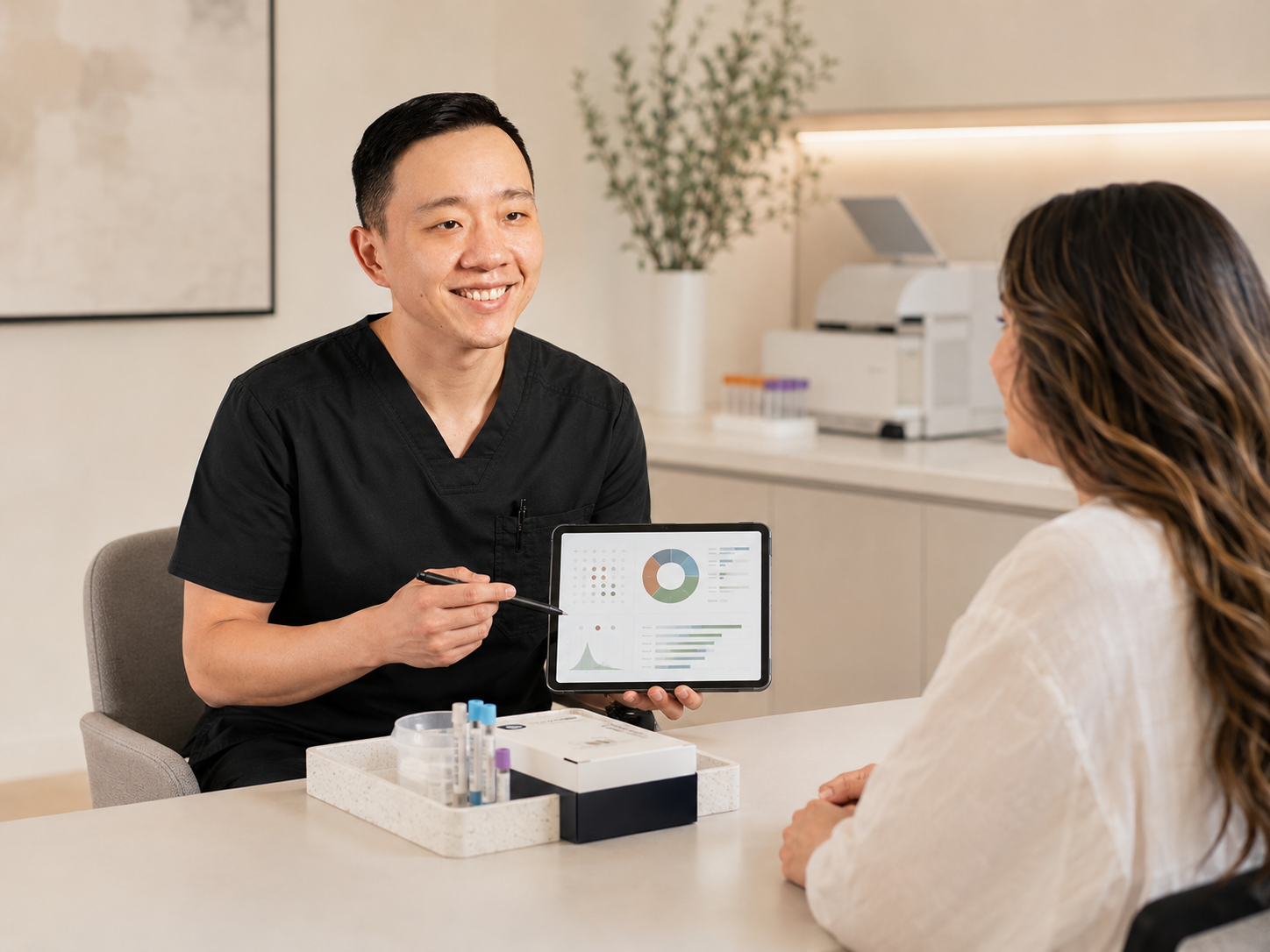 Physician reviewing advanced laboratory testing results with a patient