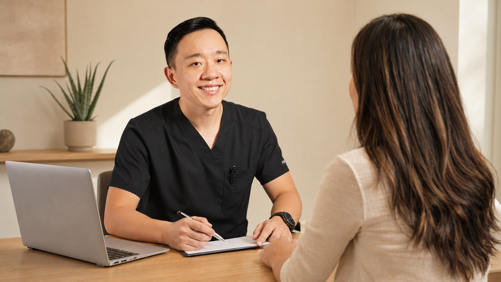 Dr. Hu discussing a personalized healthcare plan with a patient from Surprise, Arizona
