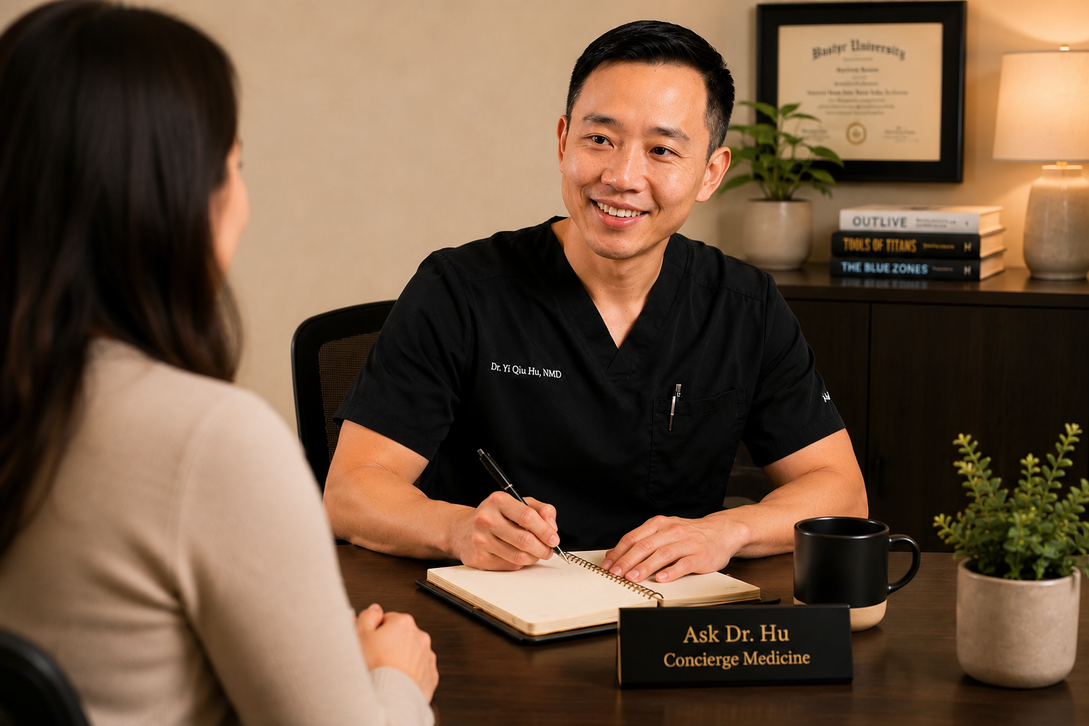 Dr. Hu reviewing laboratory blood test results with a patient during a preventive healthcare consultation.