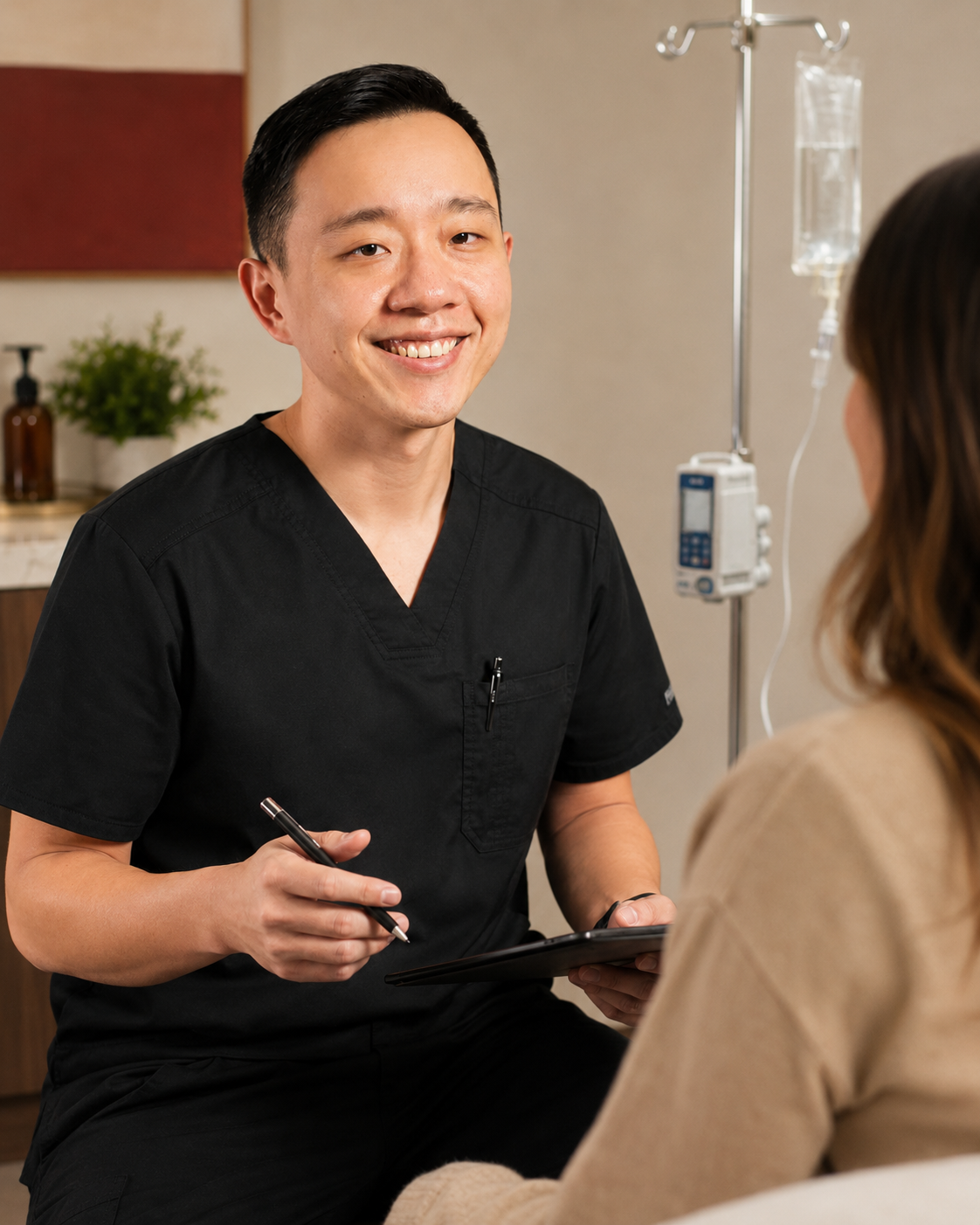 Dr. Hu discussing physician-guided IV therapy with a patient in Arizona