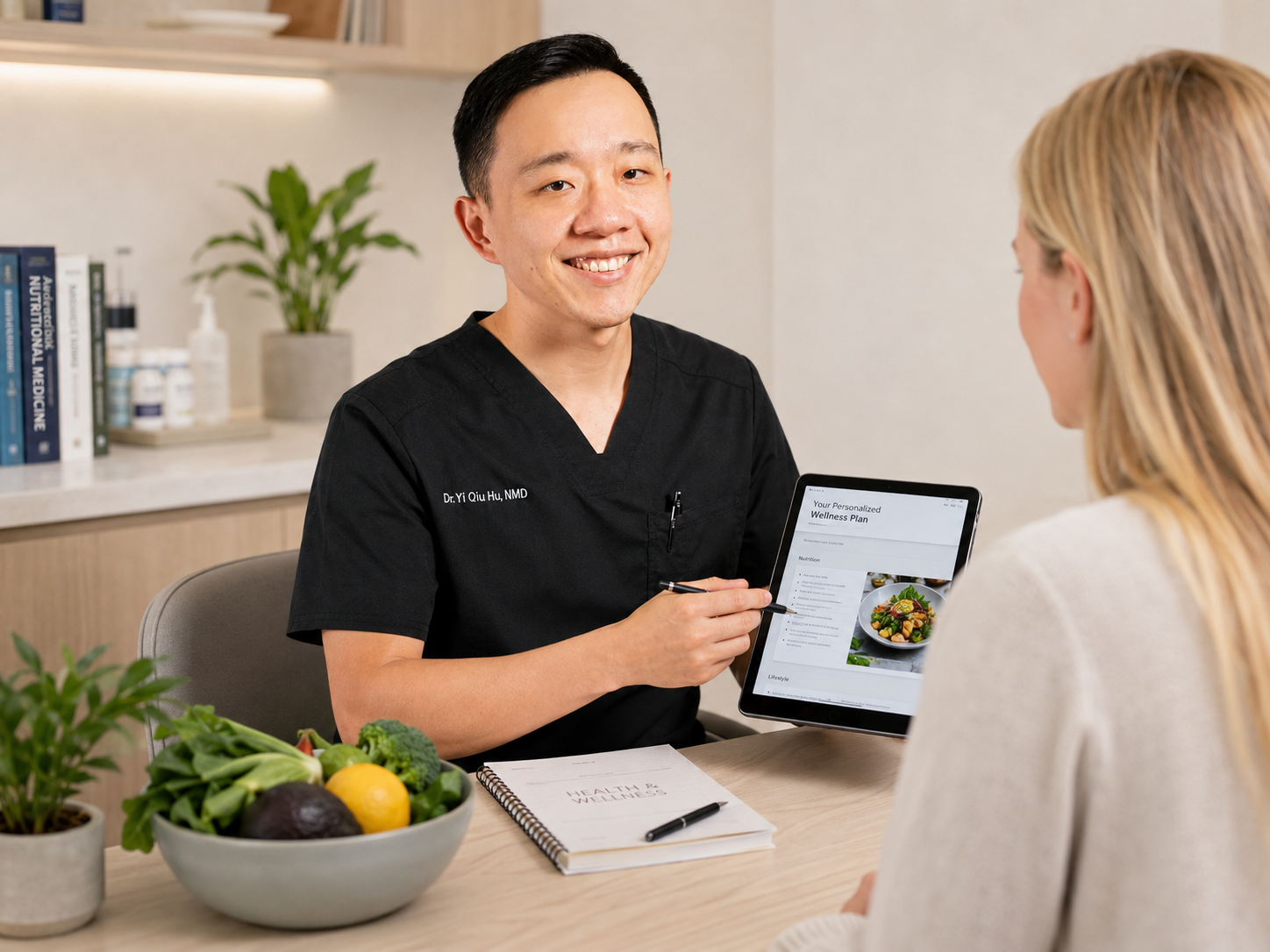 Physician discussing preventive healthcare and long-term health planning with a patient