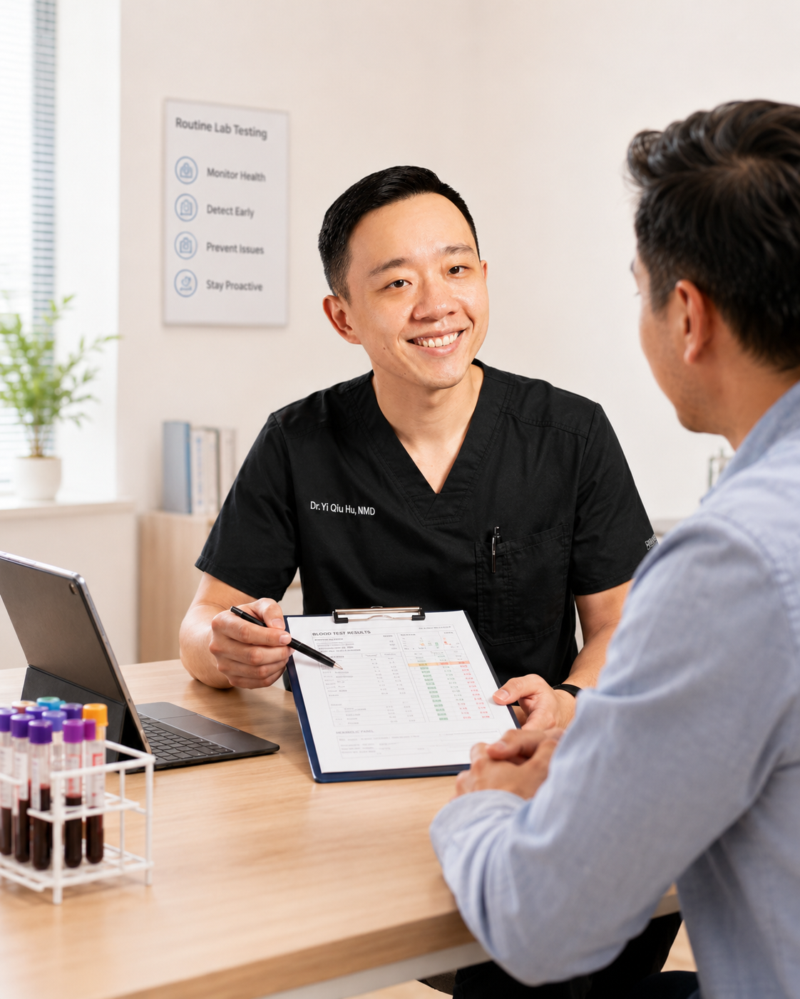 Physician reviewing laboratory reference ranges and blood test results with a patient
