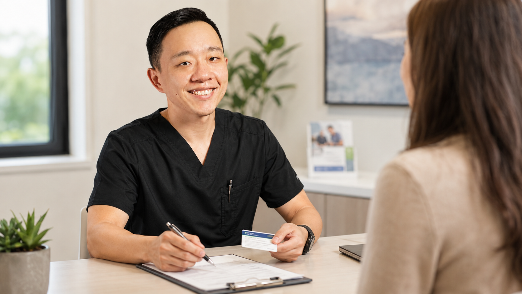 Dr. YiQiu Hu discussing cold and acute illness symptoms with a concierge medicine patient in Arizona