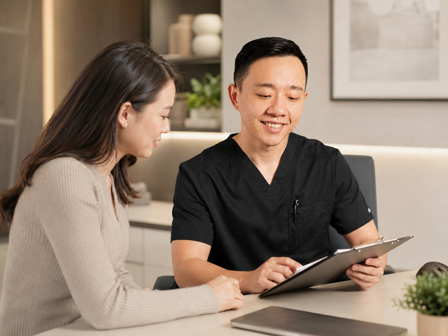 Physician reviewing medical documentation requirements and health records with a patient
