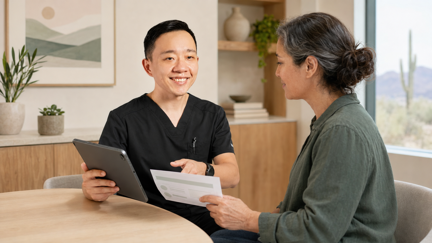 Physician reviewing medical records during an Arizona medical marijuana evaluation