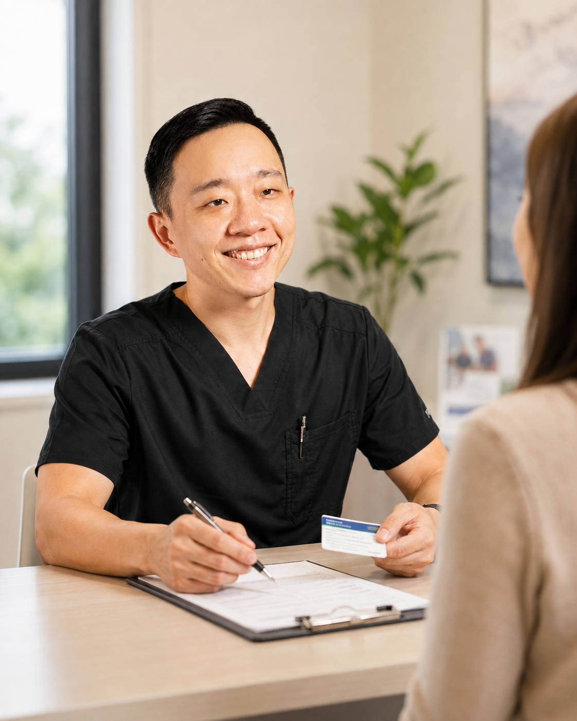 Dr. YiQiu Hu discussing cold and acute illness symptoms with a concierge medicine patient in Arizona