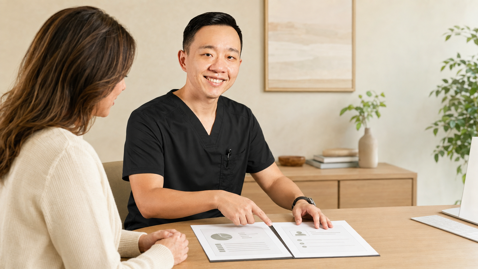 Dr. YiQiu Hu explaining how concierge medicine works alongside health insurance