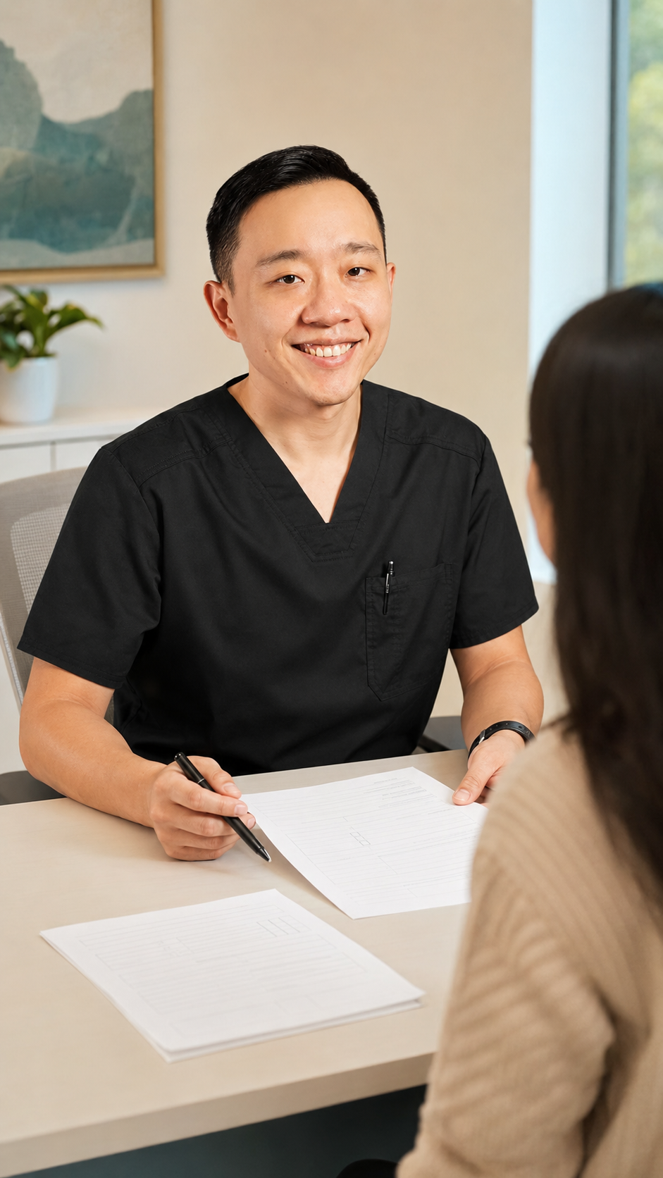 Arizona physician reviewing medical documentation with a patient