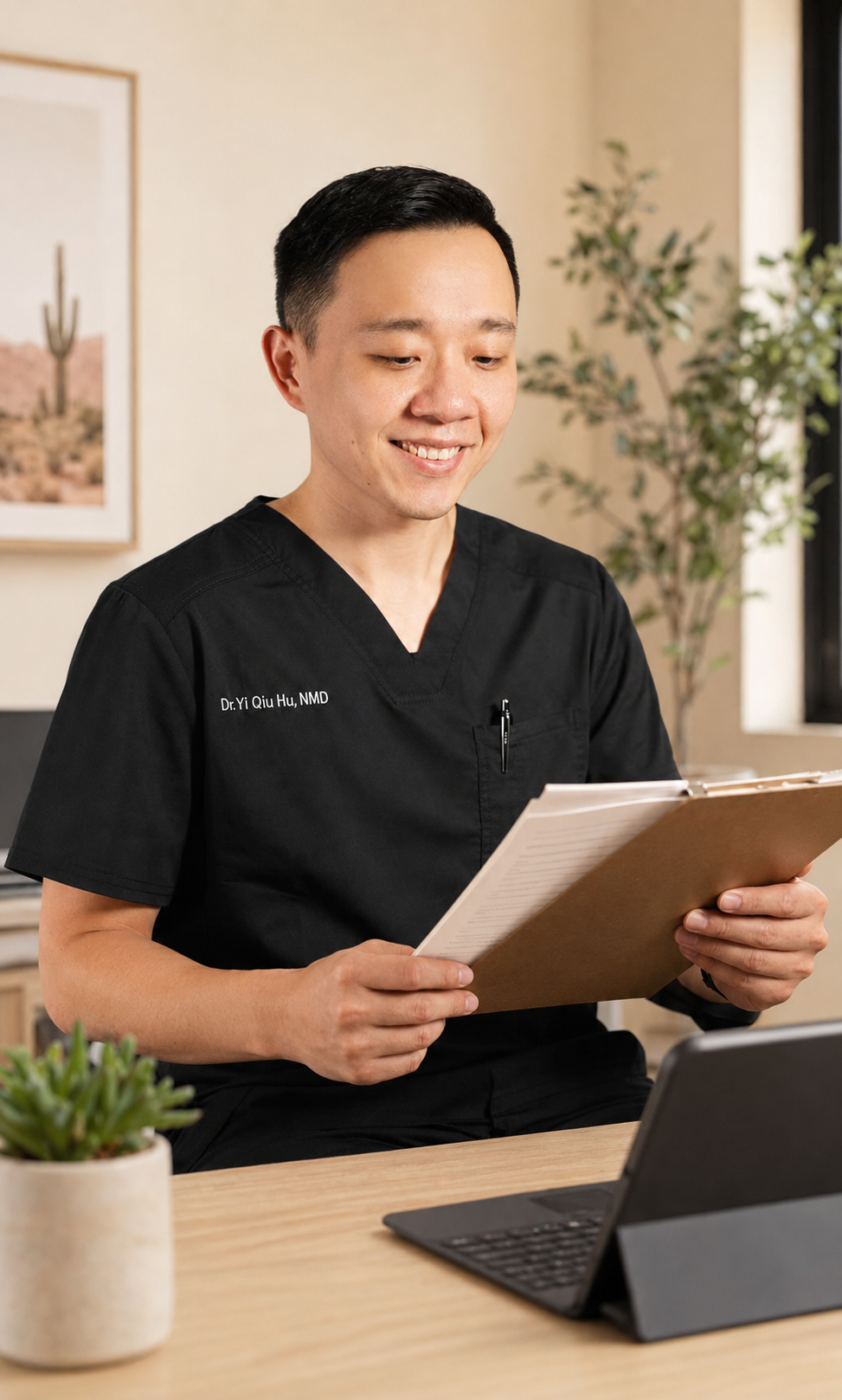 Dr. Hu reviewing medical documentation for an Arizona patient