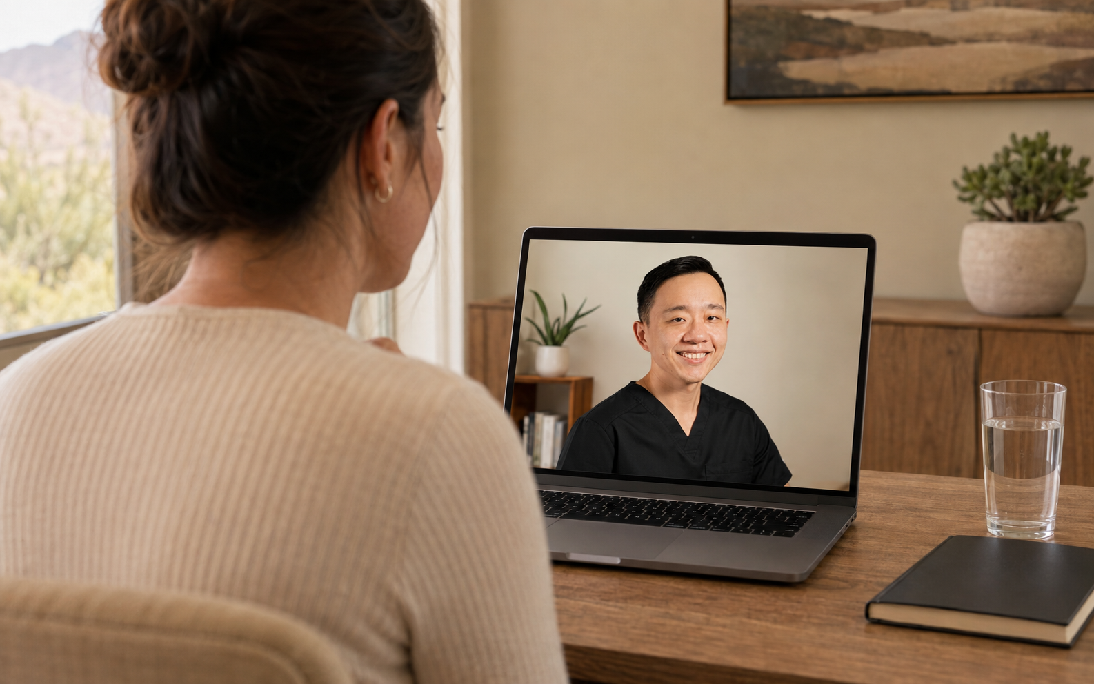 Busy Arizona professional speaking with a concierge physician during a virtual medical visit