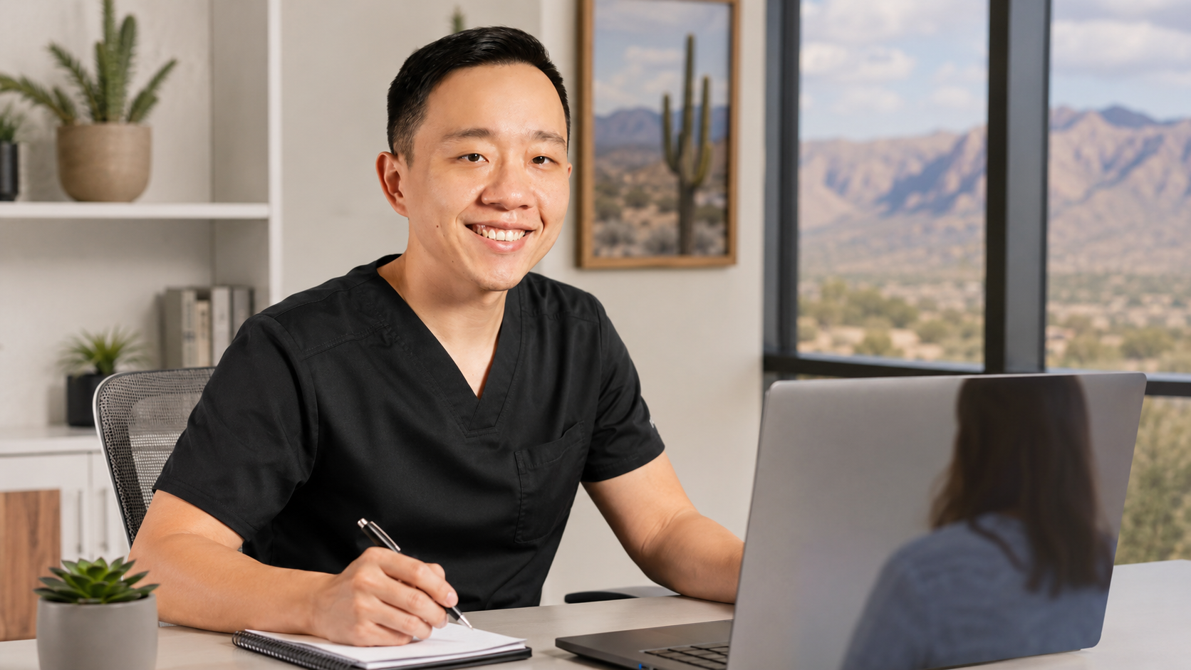 Dr. YiQiu Hu providing a telemedicine consultation for a patient in Sierra Vista Arizona