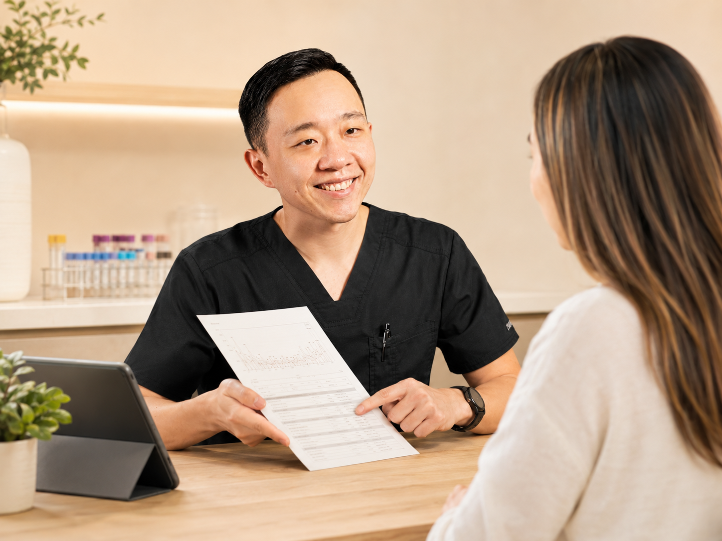 Physician reviewing laboratory results as part of a personalized healthy lifestyle and preventive care plan