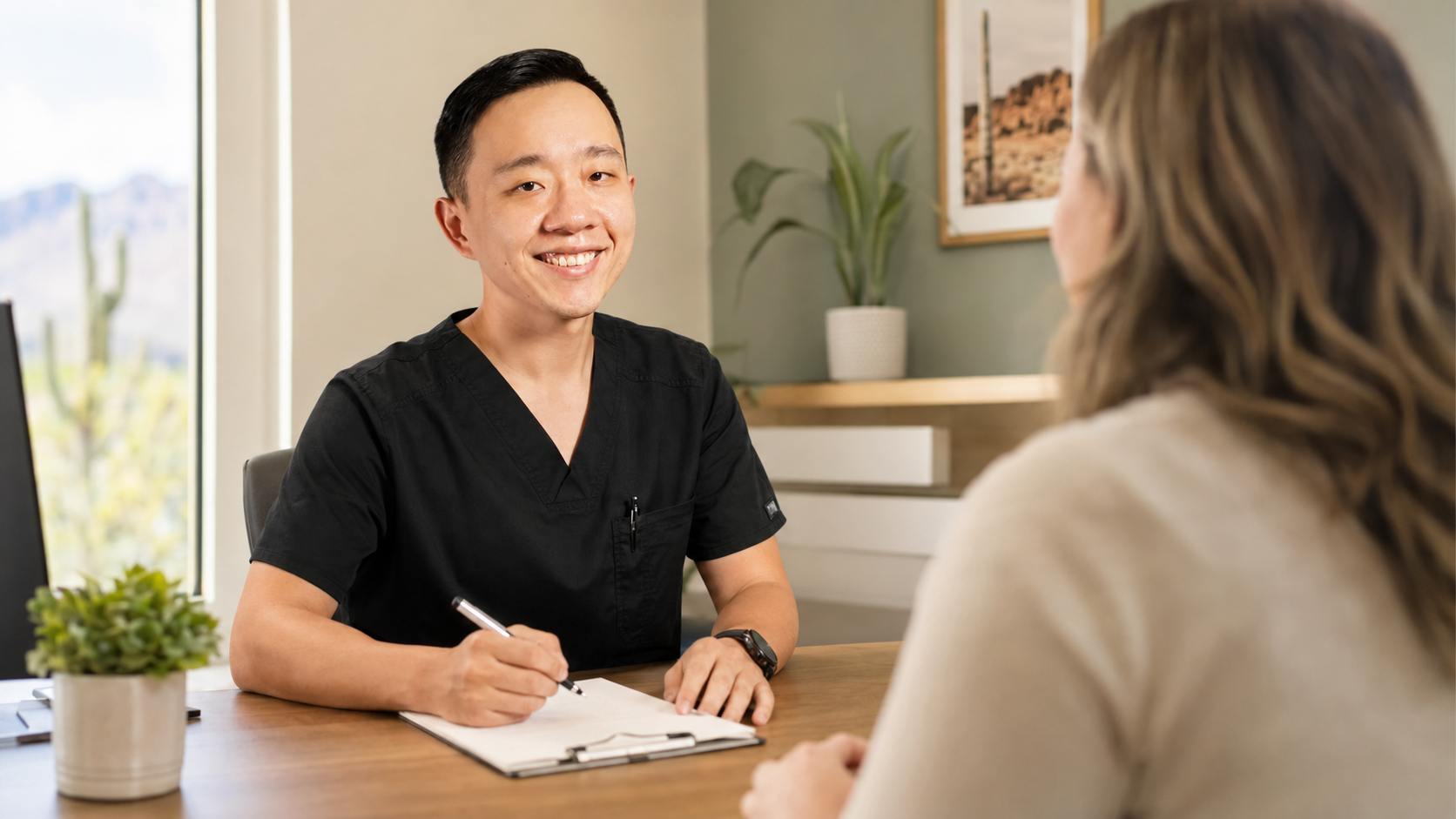 Dr. Hu discussing Arizona medical marijuana with an adult patient