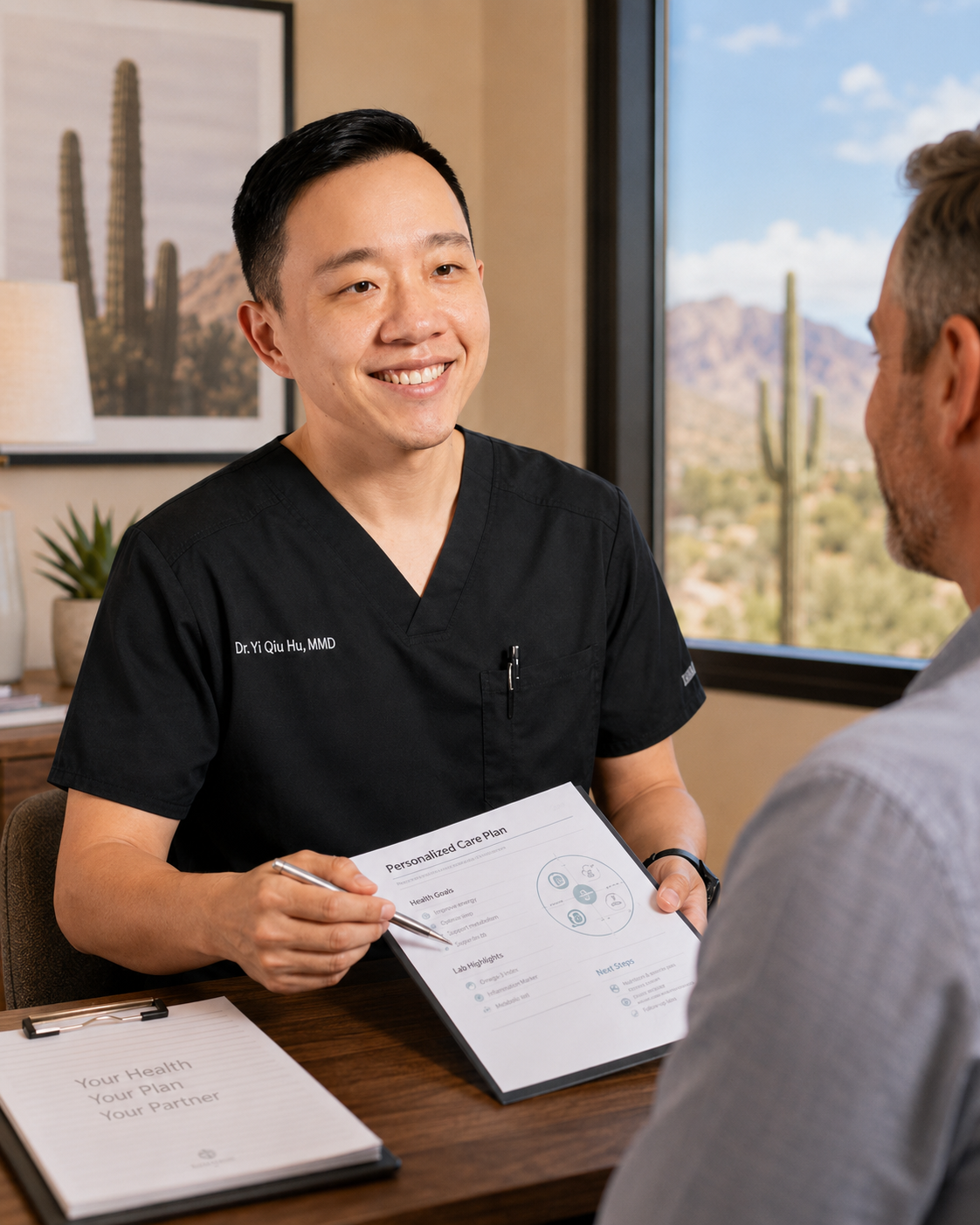 Dr. Hu providing personalized concierge medical care for a Tucson Arizona patient